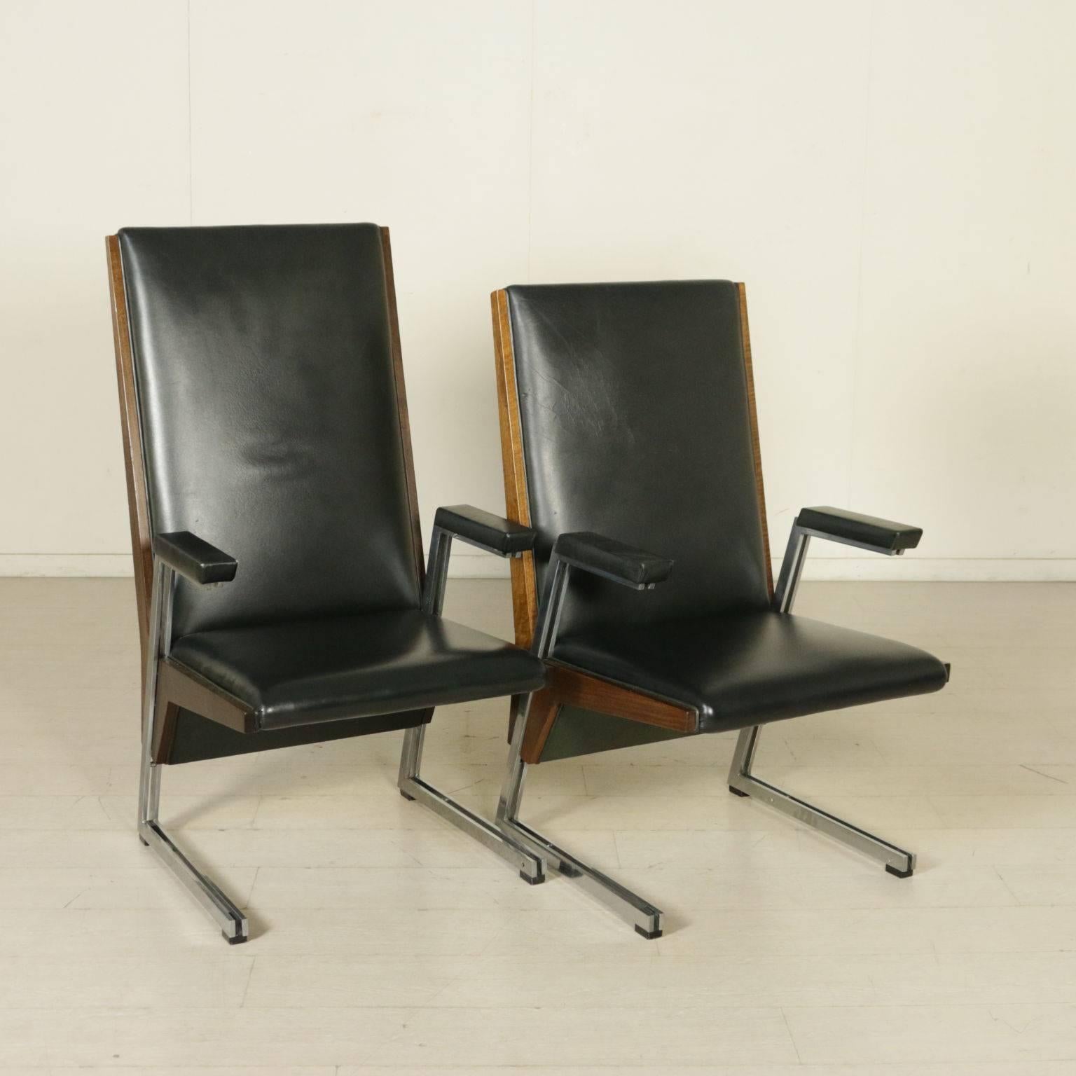 A group of eight chairs with armrests. Stained beech side bands, foam padding, leatherette upholstery, chromed metal. Manufactured in Italy, 1960s-1970s.