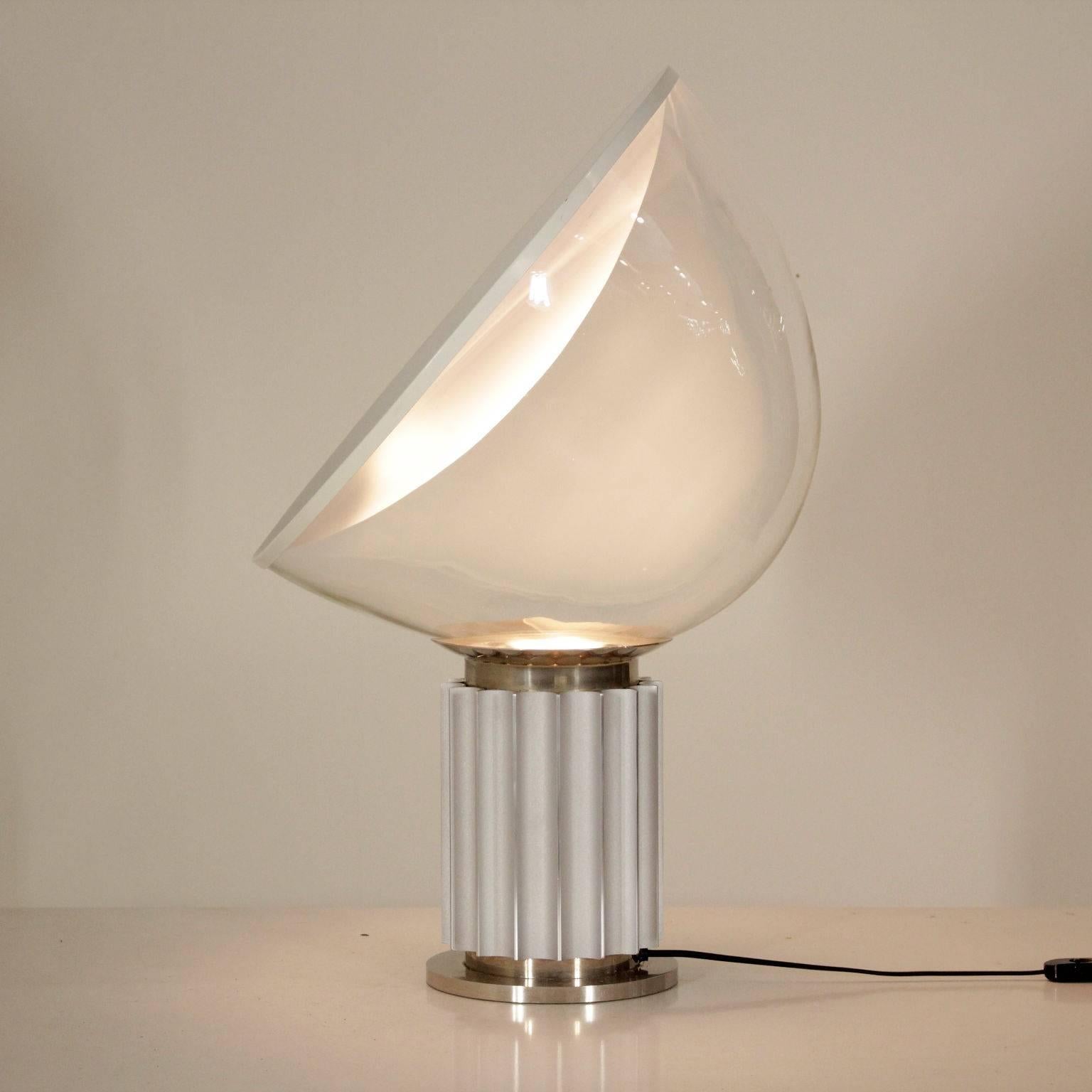 'Taccia' table lamp with indirect lighting designed by Castiglioni brothers for Flos. Metal and aluminium base, glass adjustable diffuser. Manufactured in Italy, 1960s. As Gramigna wrote: ' Taccia lamp, using particular lighting techniques for the
