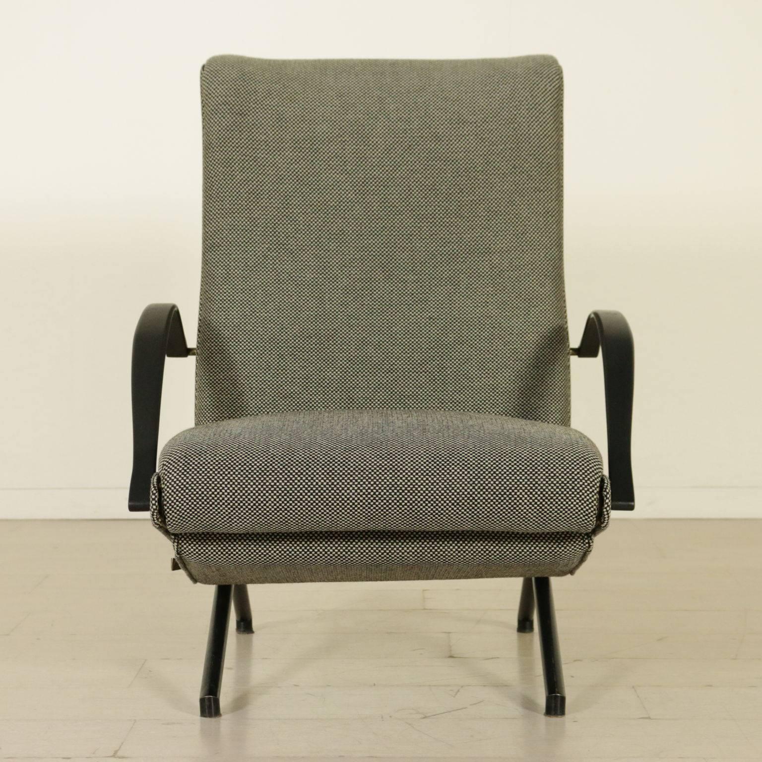 A first edition armchair designed by Osvaldo Borsani (1911-1985) for Tecno. Movable elements and flexible arms, metal structure, foam padding and fabric upholstery. Model: P40. Manufactured in Italy, 1950s.