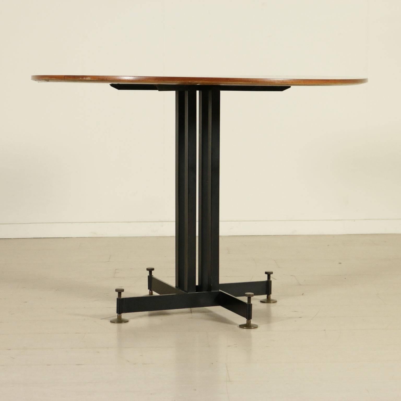 A table, mahogany veneer, metal legs with adjustable brass foot. Manufactured in Italy, 1960s.