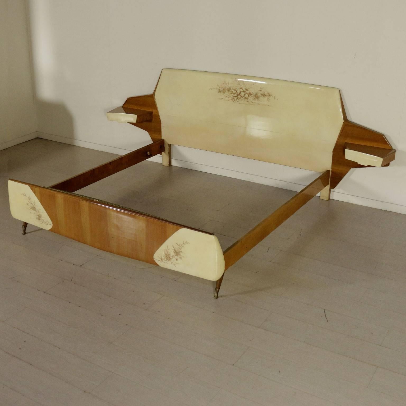 A double bed with hanging bedside tables, mahogany veneer and lacquered with flower drawings, retro treated glass. Manufactured in Italy, 1950s-1960s.