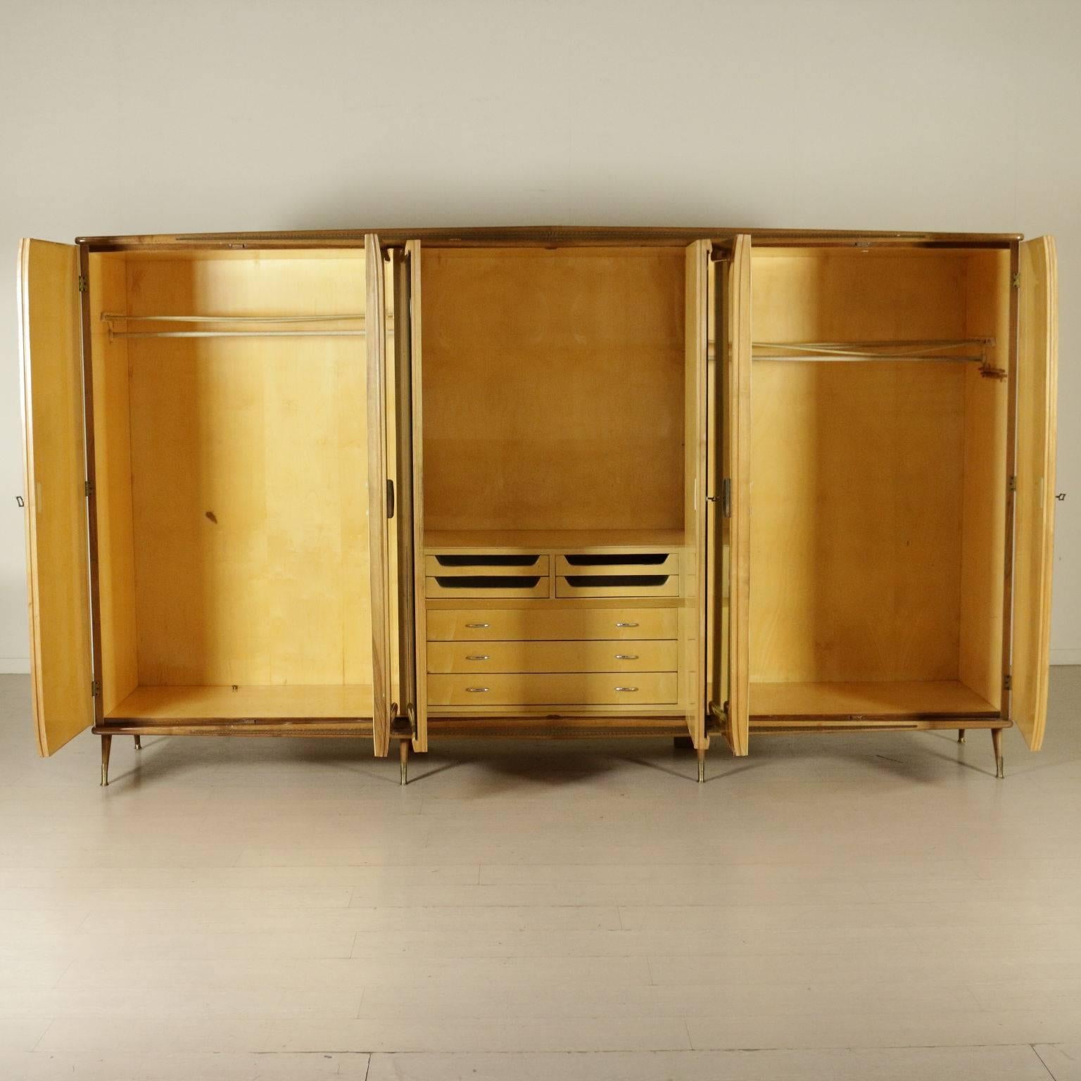 A mahogany veneered wardrobe, lacquered with flower drawings, mirrors and brass. Manufactured in Italy, 1950s-1960s.