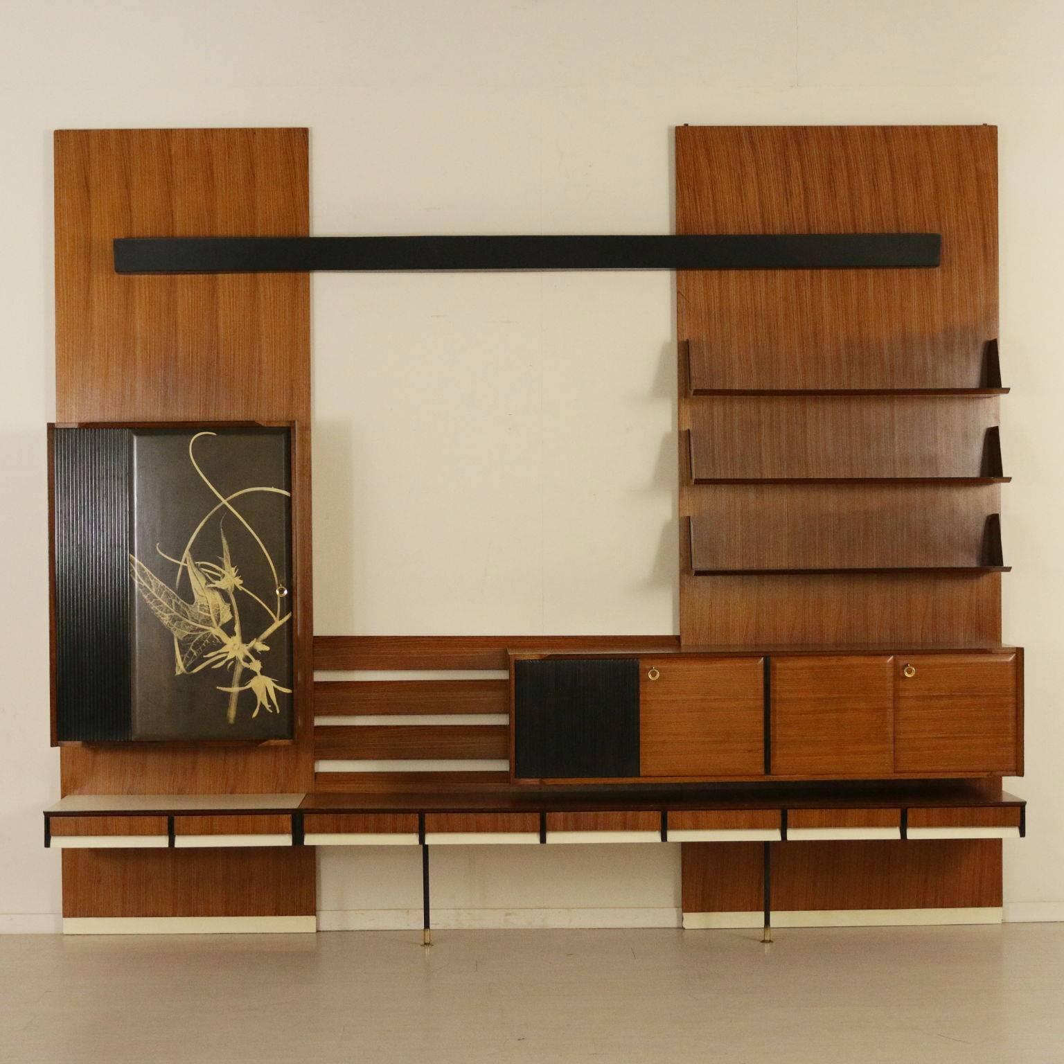 A living room cupboard with hanging containers, rosewood veneer, Formica inserts. Metal legs with brass ferrules, place for lights. Manufactured in Italy, 1960s.