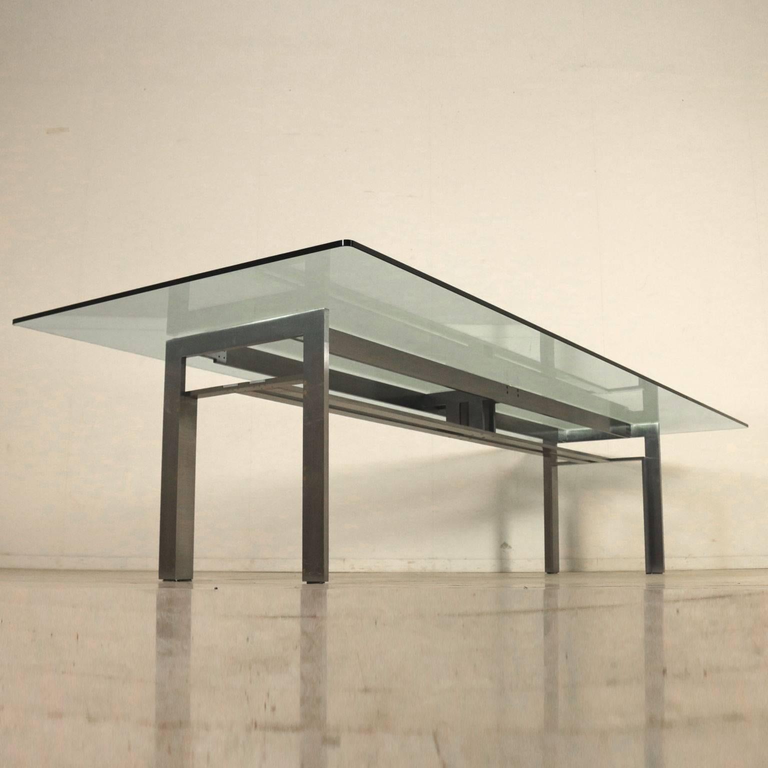 A table designed by Carlo Scarpa (1906-1978) for Simon. Model: Doge. Steel structure with brass spacers, glass top. Manufactured in Italy, 1970s-19780s.