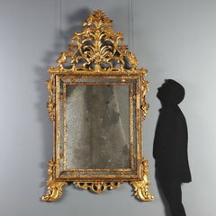Miroir en bois de tilleul sculpté et doré, Piémont, milieu du XVIIIe siècle