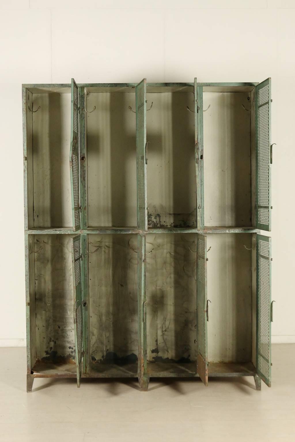 A double metal cabinet, open on two sides by te large Milan based firm Industrial vintage.