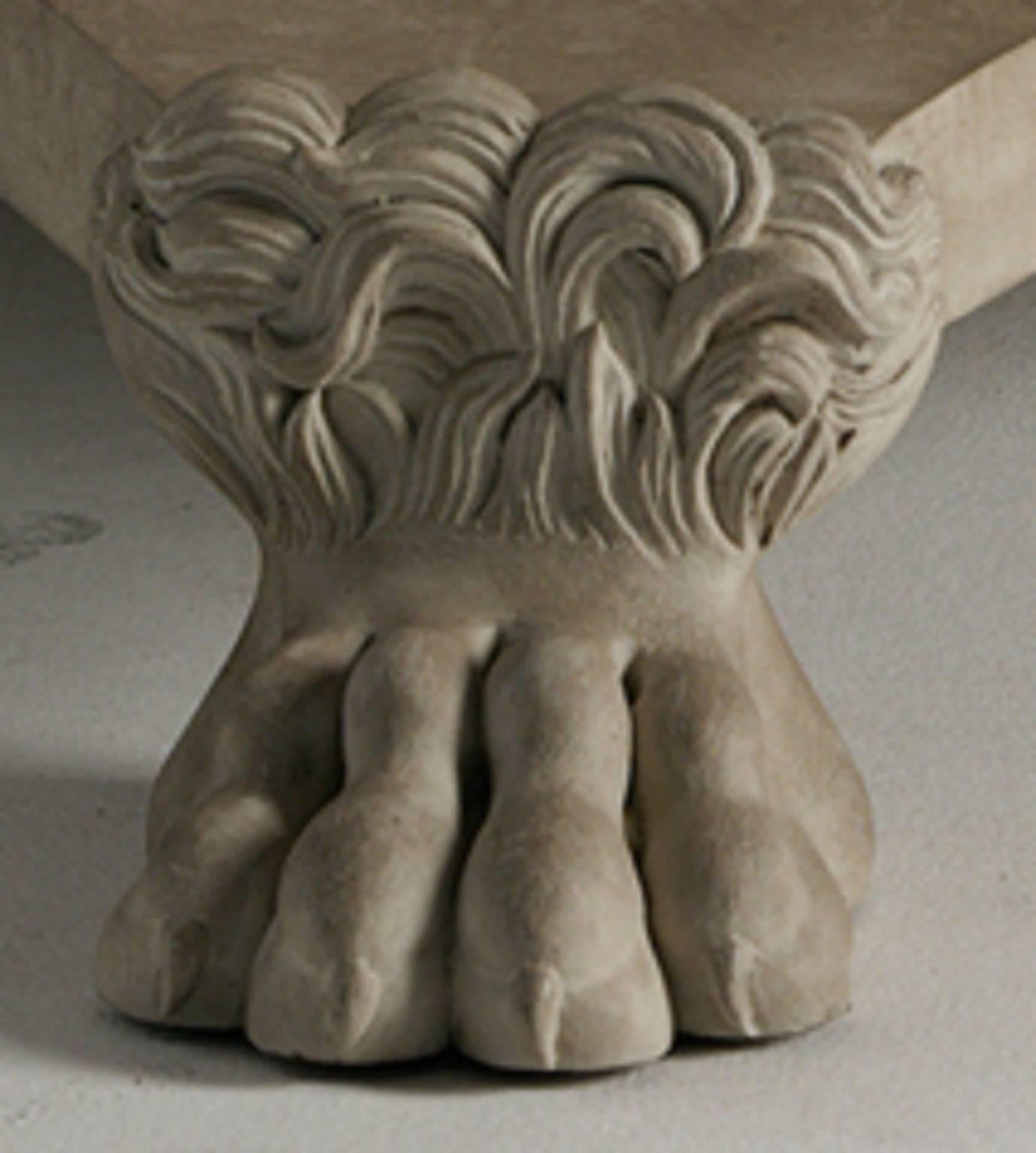 An acanthus leaf carved and painted marble-topped centre table with triform base and Romanesque hairy paw feet.

We are currently working to a 30-36 week lead time.
