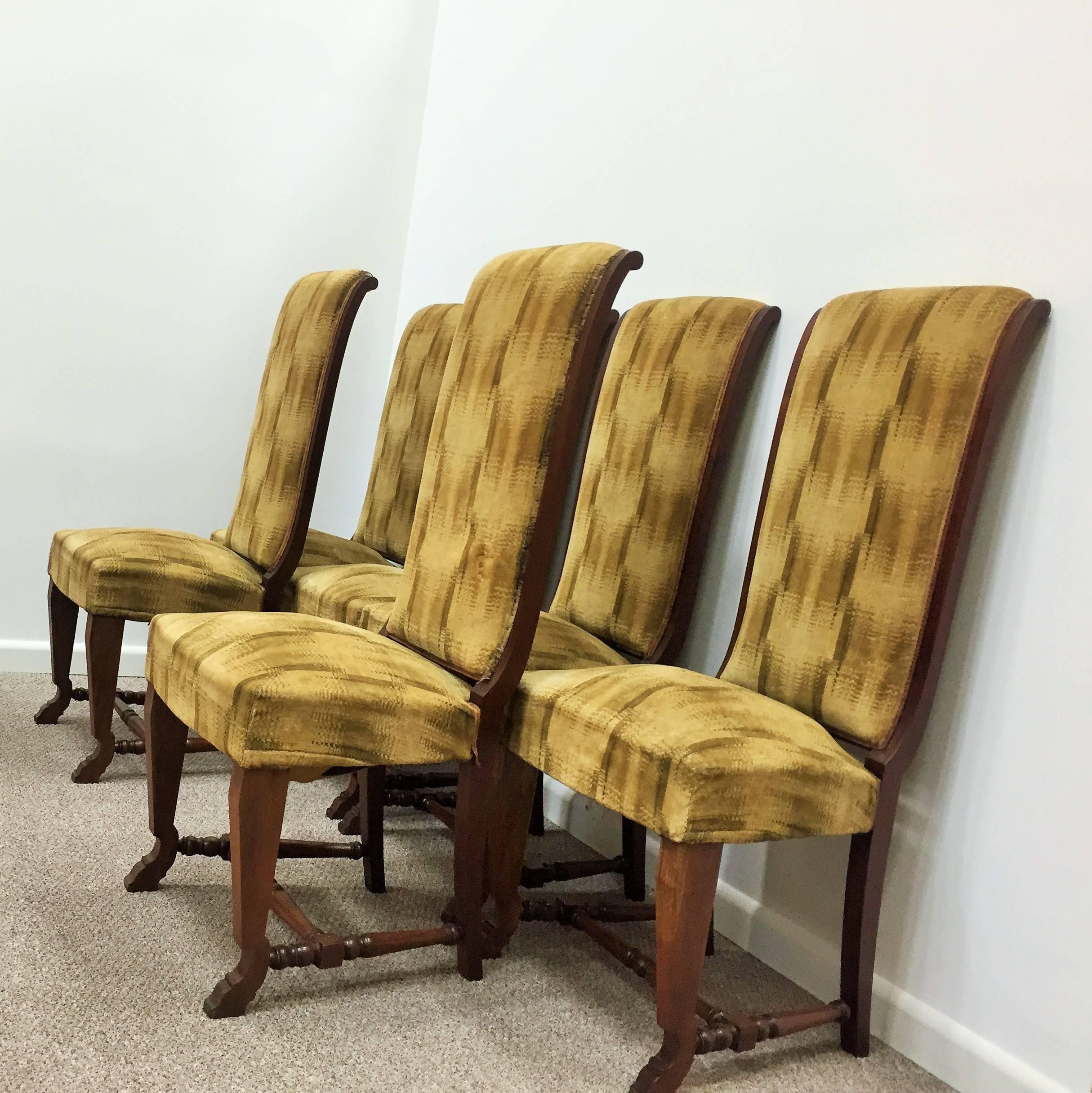 Set of fine original French modernist dining chairs. Tall backs with elegant cabriole front legs and tapered splay back legs. All six chair frames have been completely restored, reglued and French polish refinished in a dark walnut color. They are