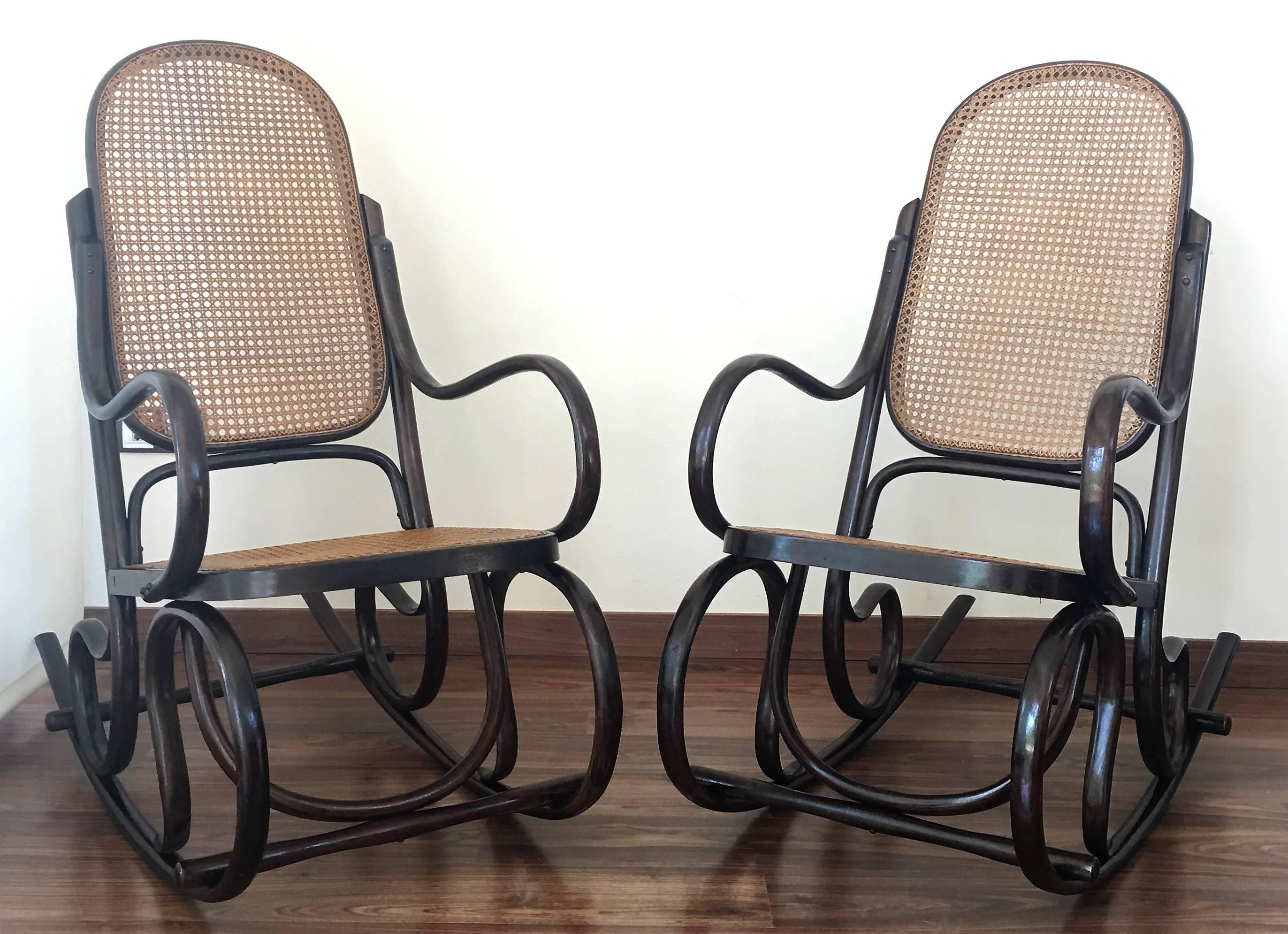 20th Century Pair of Bentwood Rocking Chairs with Cane Seat and Back
