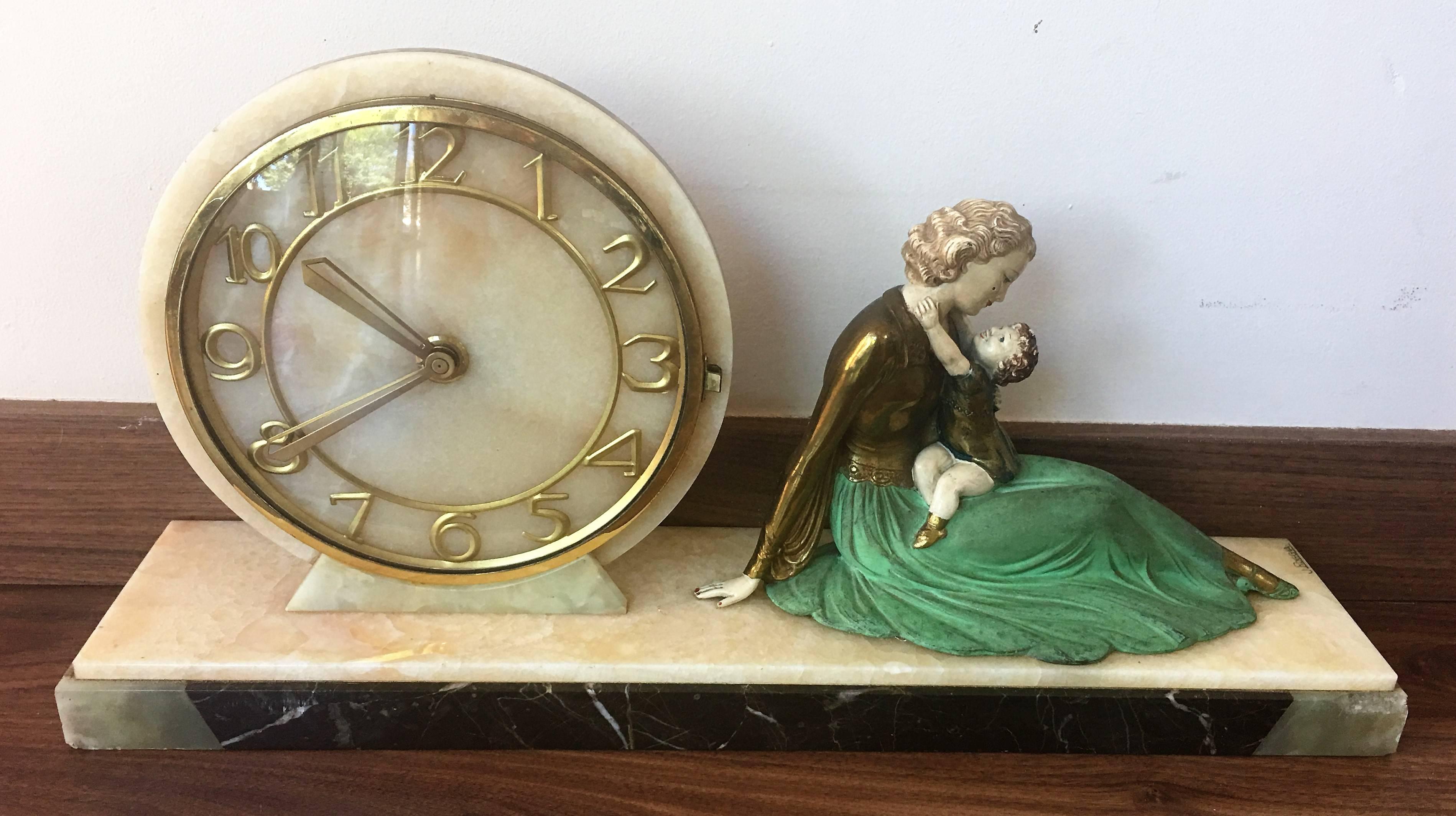 Art Deco clock with figurine, circa 1920
This marble based clock was produced in Paris in the early 1920s.
The figurine is bronze-plated cold painted spelter with fine detail

