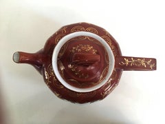 Plum Red-Ground Saltglaze Stoneware Teapot and Cover, circa 1940