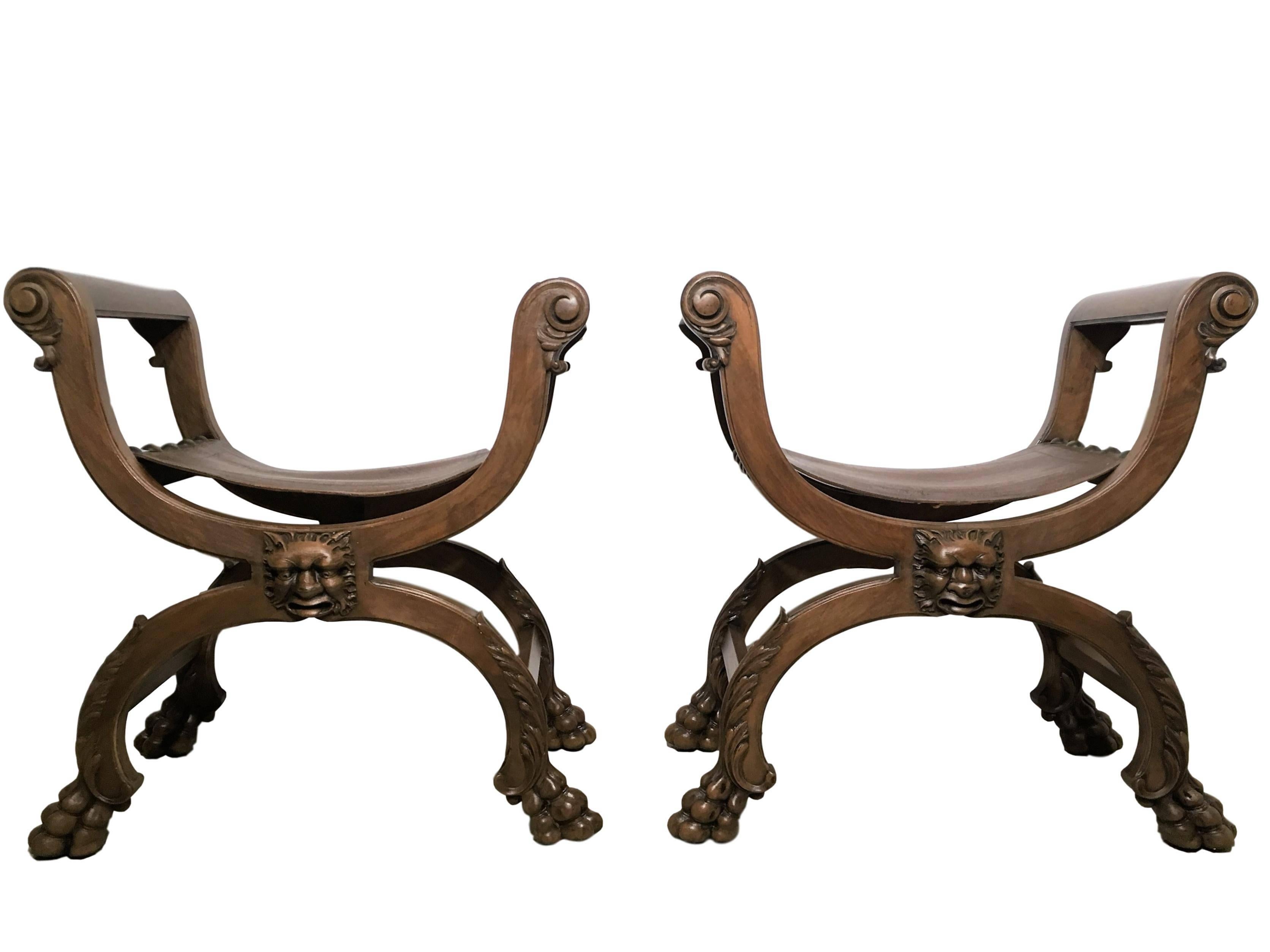 19th century period Gustavian pair of benches, Savonarolas, carved rams head and hoof with original leather seat.