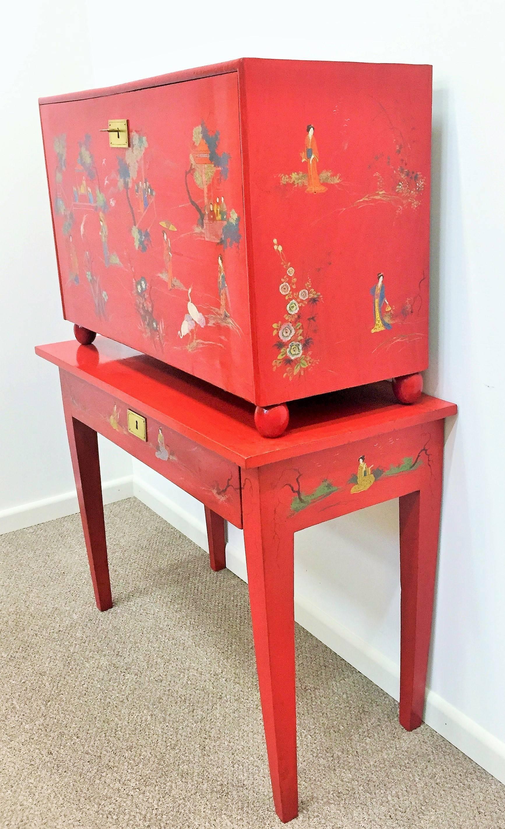 20th century red lacquer barqueno with Japanese style design. Fine painted motif in gold gilt, brass fitting, beautiful color form and detail.