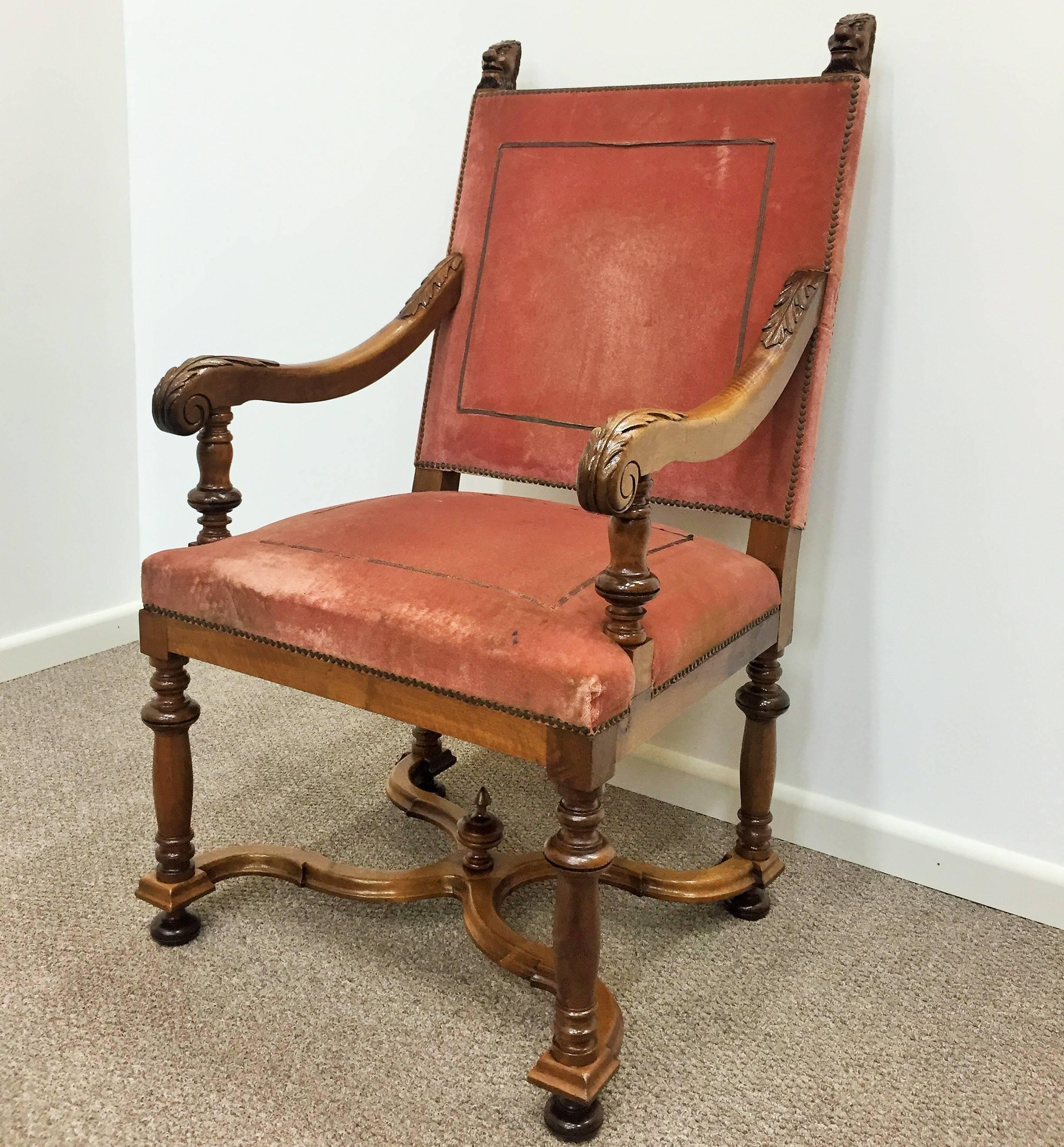 Fantastic French Louis XIII style armchair or Os de Mouton throne chair with stylish carved with a touch of the Sun King, Louis XIV, Baroque. Hand-rests feature a carved lion-head for more regal flair, while the legs and supports all feature more