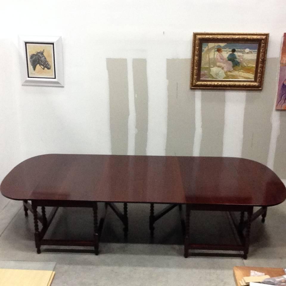 Late Regency period two-part dining table or conference table in mahogany.