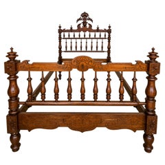 Spanish Carved Wood Queen Size Bed with Turned Spindles and Ornate Crest