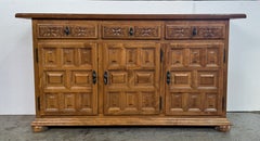 Spanish Rustic Carved Wood Sideboard or Cabinet with Three Drawers and Doors