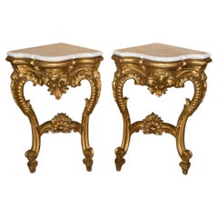 Pair of Antique Rococo Style Giltwood Corner Console Tables with Shaped Marble T