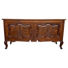 French Louis XV Style Carved Walnut Blanket Chest with Floral Motifs
