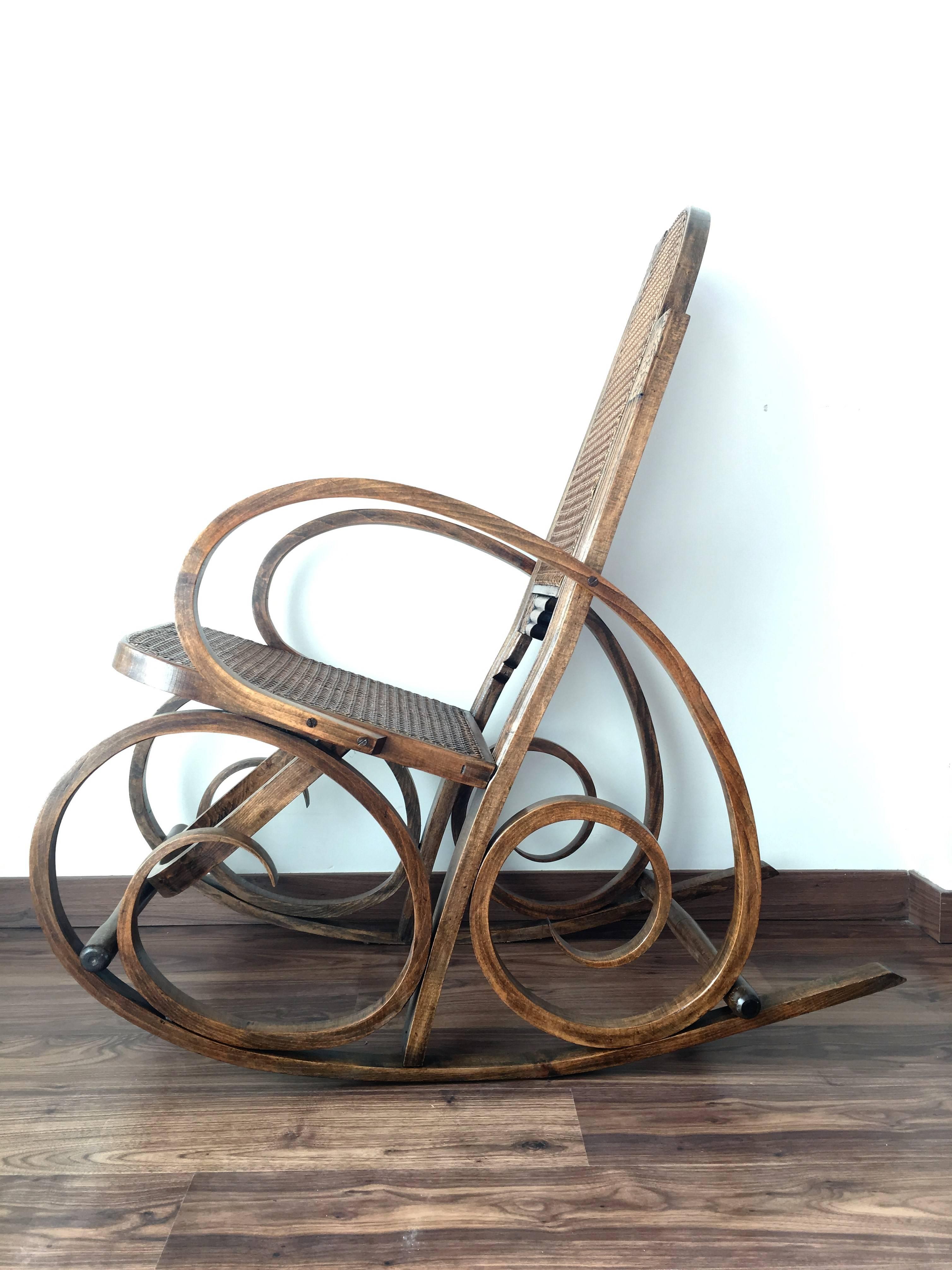 Stuning Art Deco bentwood and reed seats rocking chairs.
          