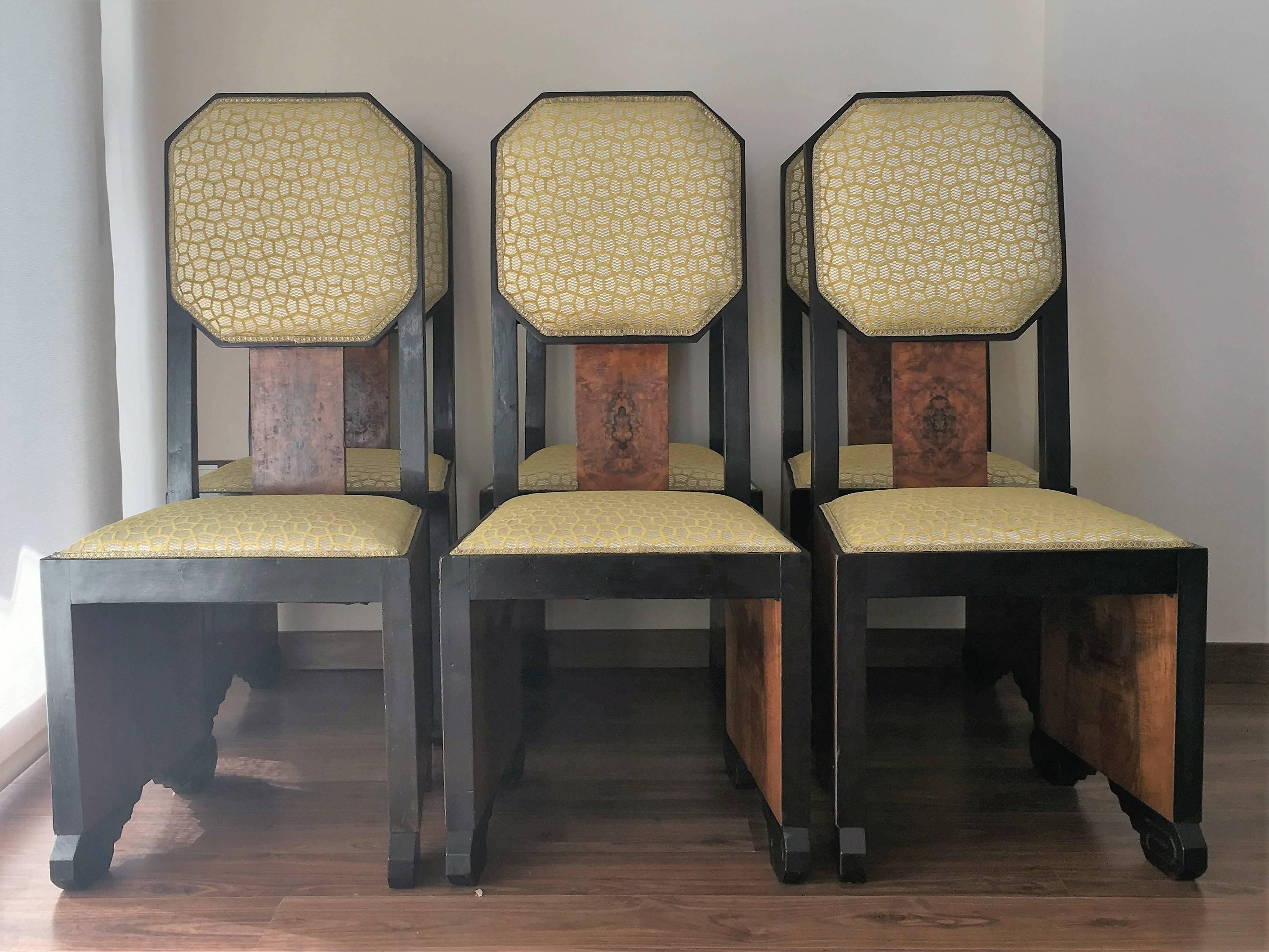 Mid-Century dining chairs reupholstered in burl wood and walnut.

Beautiful gold geometric fabric by Lizzo, Italy.