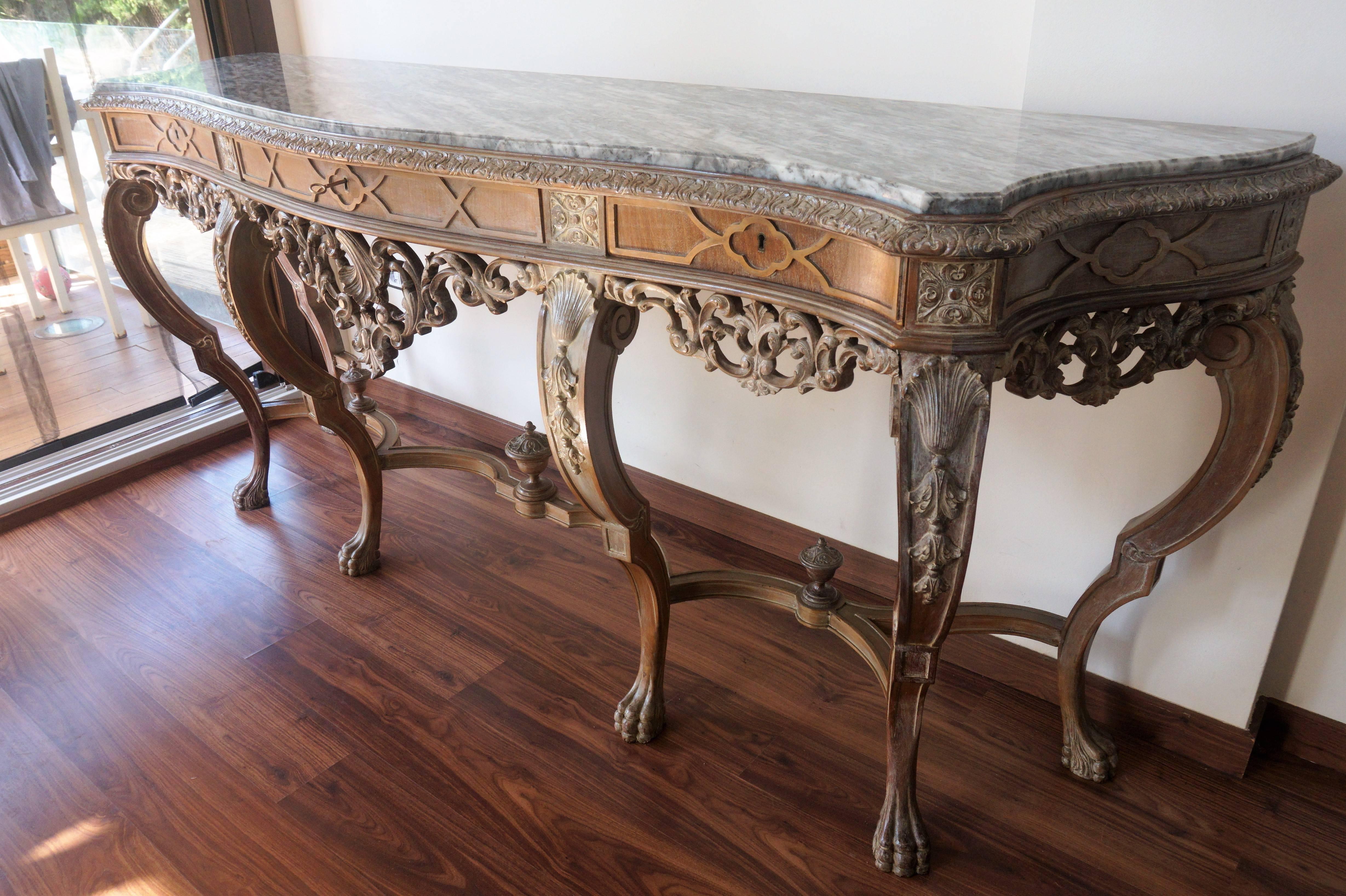 Spanish console table with marble top by Mariano Garcia.

