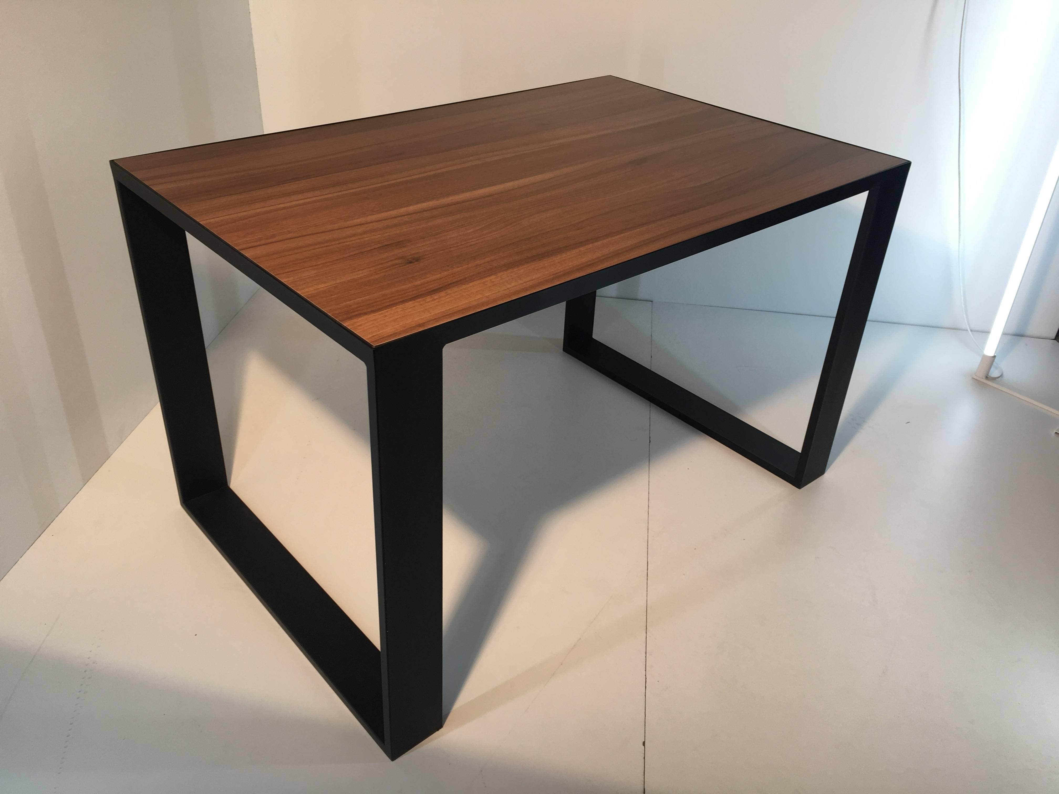 Rectangular iron cube table with embedded wood top. Dinner table. Desk table 

Frame material: Extruded and hand-welded iron rods
Frame finish: Black 
Iron rods dimensions: 3.93in x 0.78in
Top: 0.7in wood


Bespoke and handmade, available to