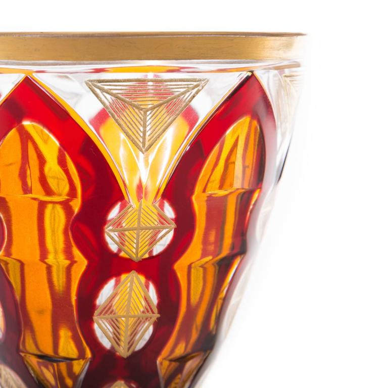 From our selection of one a kind special antique goblets. Perfect for your bar and cabinet display. This lovely piece is from one of the glass makers in the Czech Republic and features vibrant colors of garnet ruby and amber with nicely cut to clear