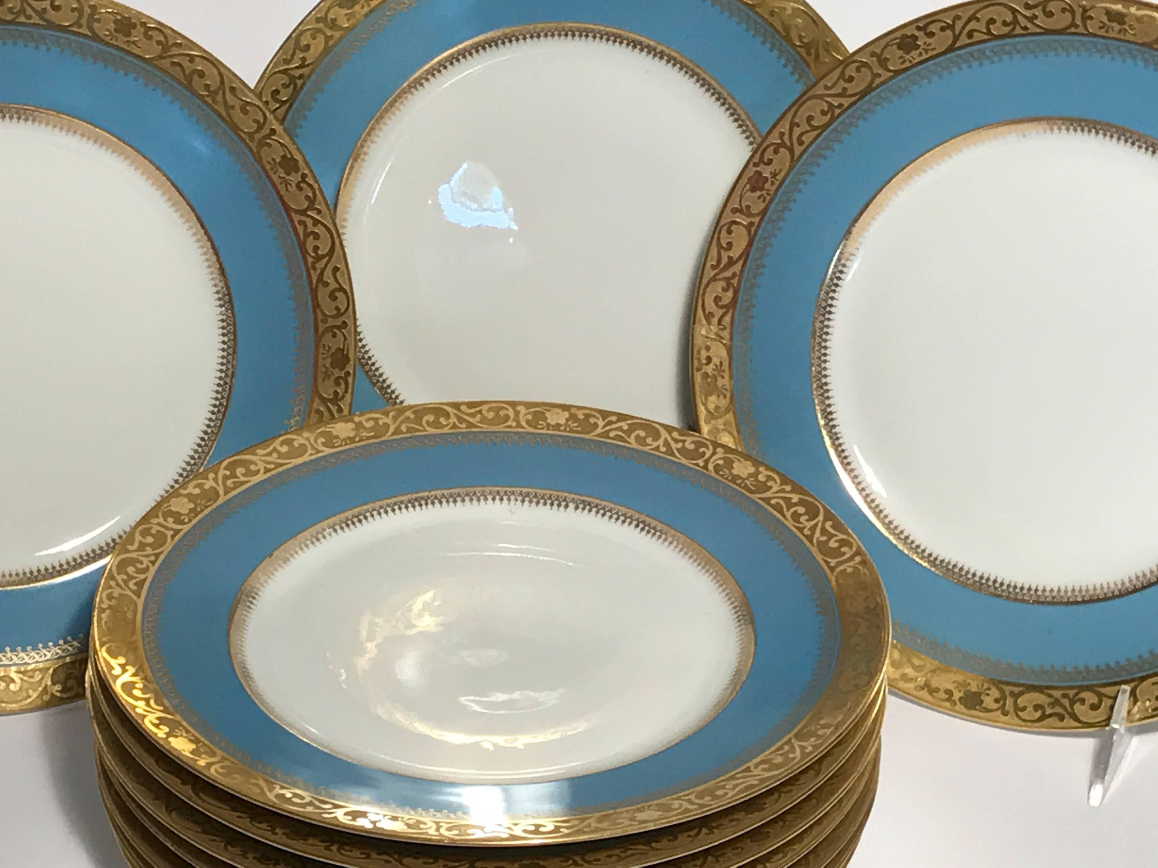 Classic and elegant, these plates feature a nice turquoise shoulder with a textured gold band. Crisp white porcelain. These will mix and match nicely with all your fine china and add a nice burst of color.