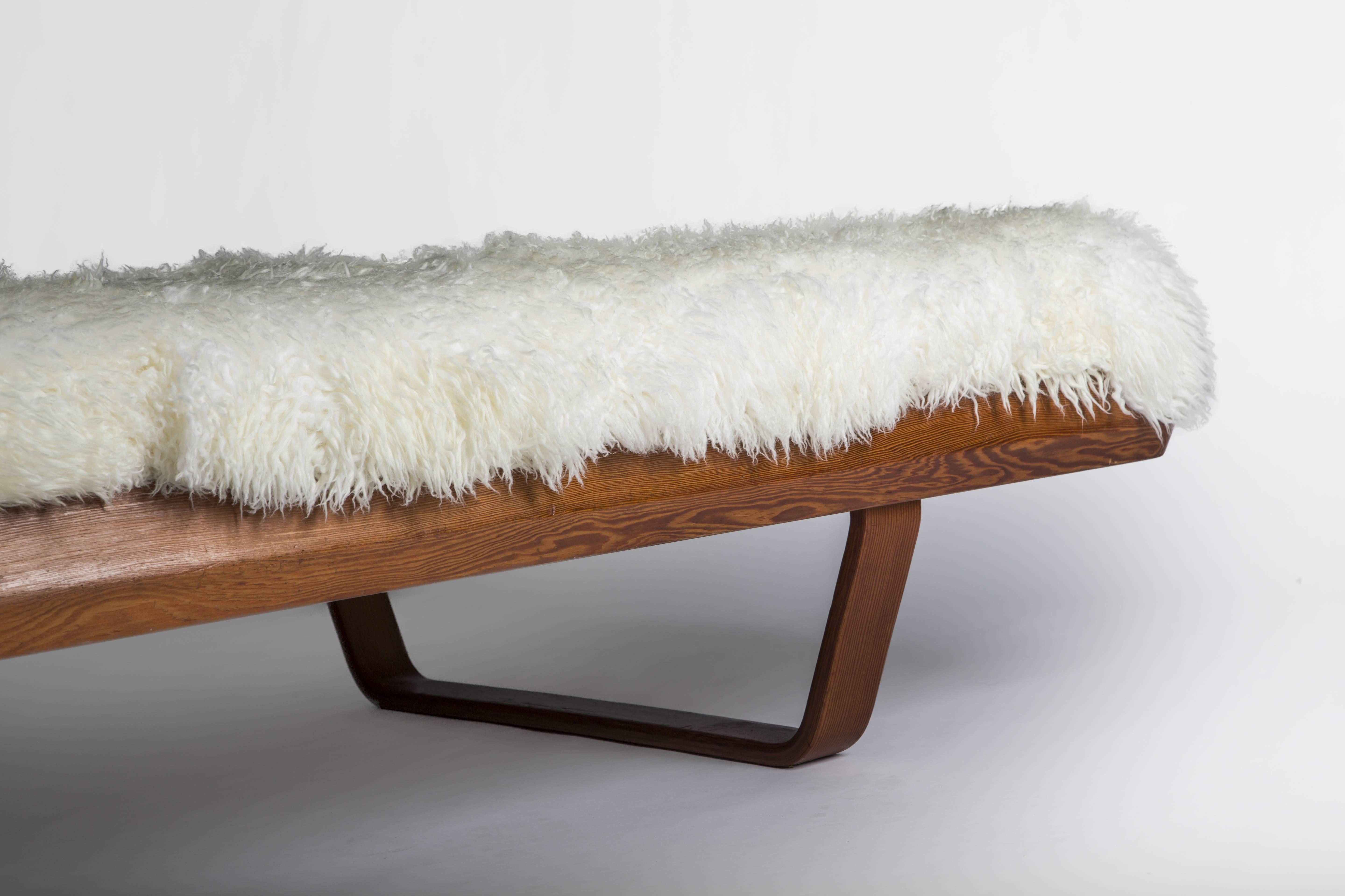 Daybed in Oregon pine, mattress covered in sheep skin.

Danish work by designer Grete Jalk, dated circa 1950.