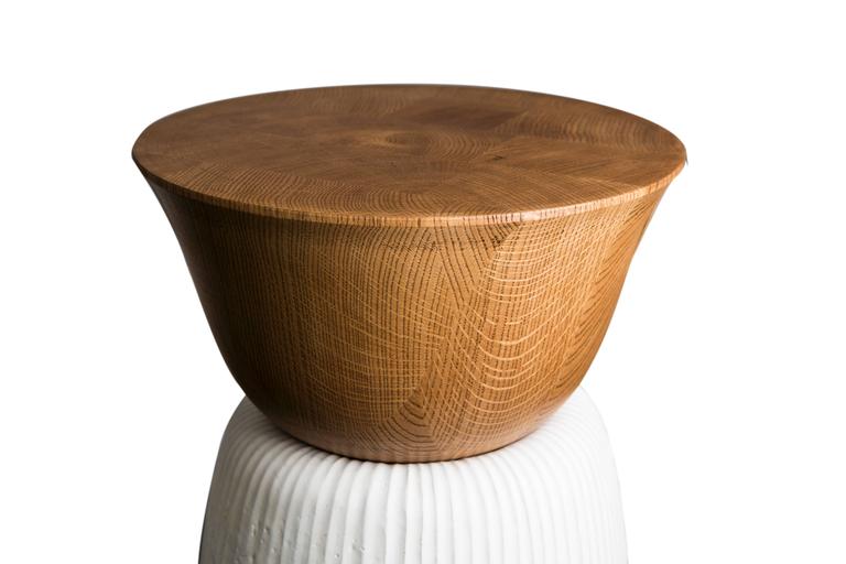 Side table, base in white enameled sandstone, the top in turned-wood.

French work made and designed by Emmanuel Levet Stenne, designer, and Isabelle Sicart, ceramist. Edition of 24, May 2014.
