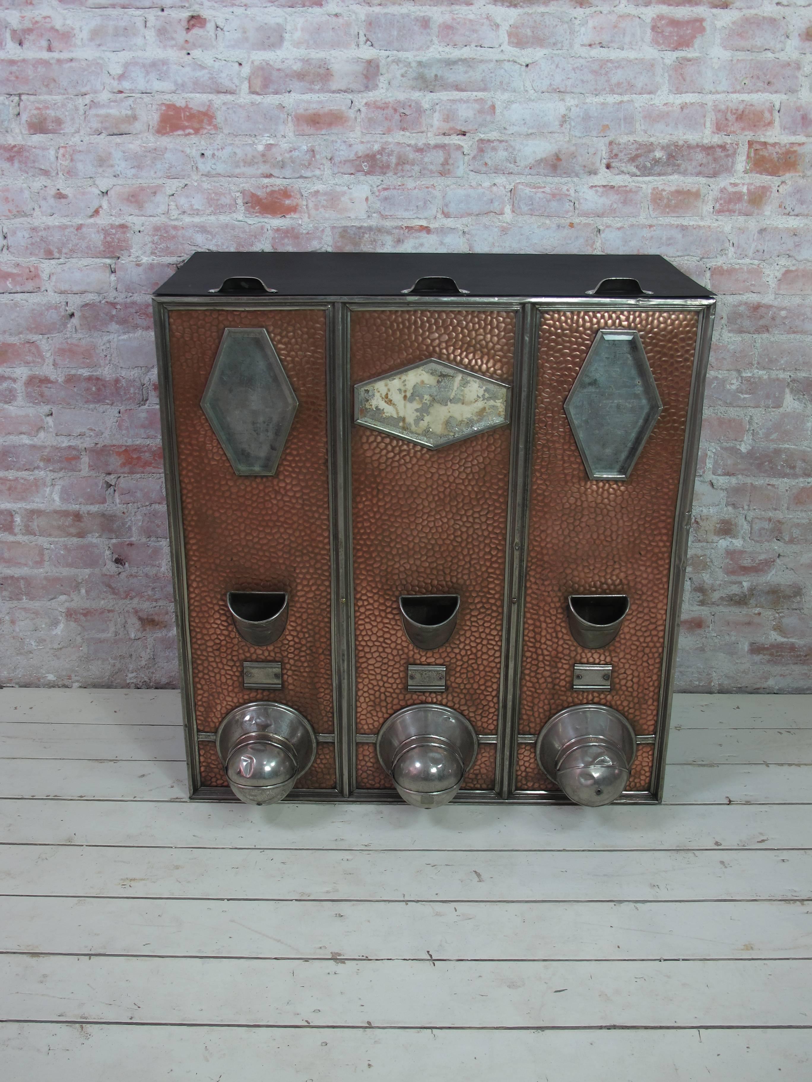 Copper and tin container for storage. The diamond shape faceted windows show the content.