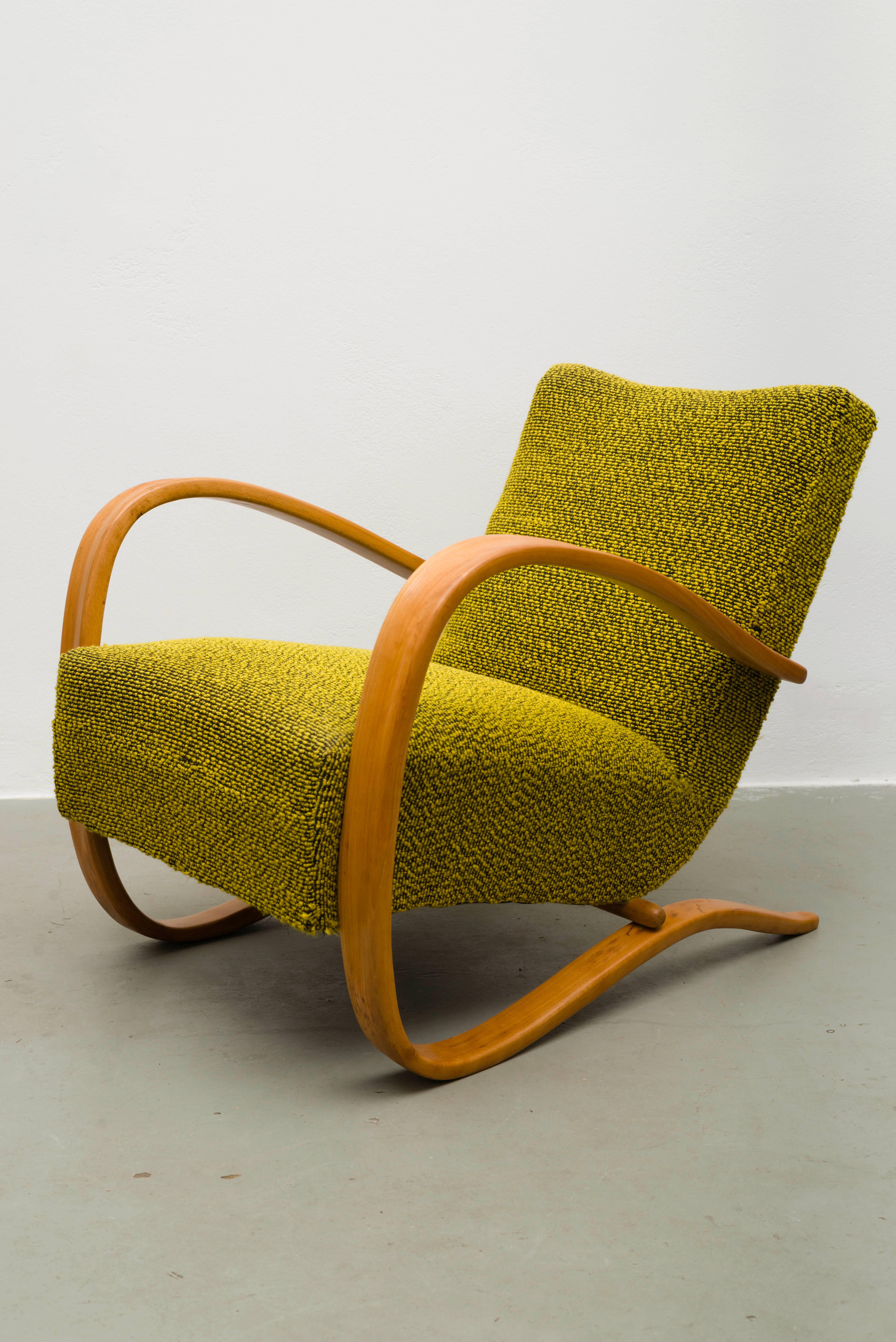 This set of two model H-269 lounge chairs was designed during the 1930s by Jindrich Halabala for Spojene UP Zavody in former Czechoslovakia. 
The chairs feature bentwood frames and are upholstered with their original fabric. The wood has been