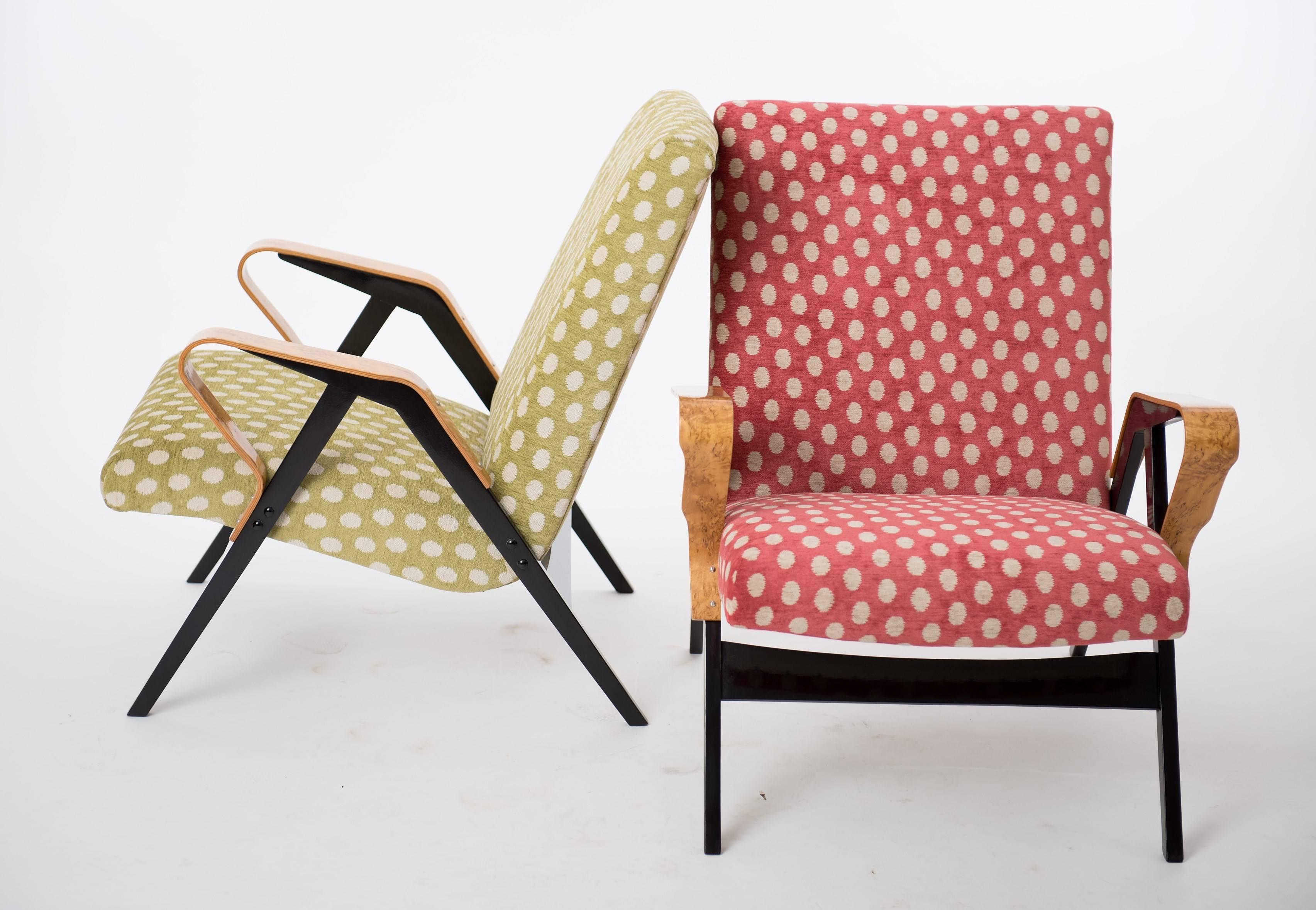 These two lounge chairs were produced in the 1960s by the Czechoslovak company Tatra. They feature new upholstery in English fabric from Colefax and Fowler.