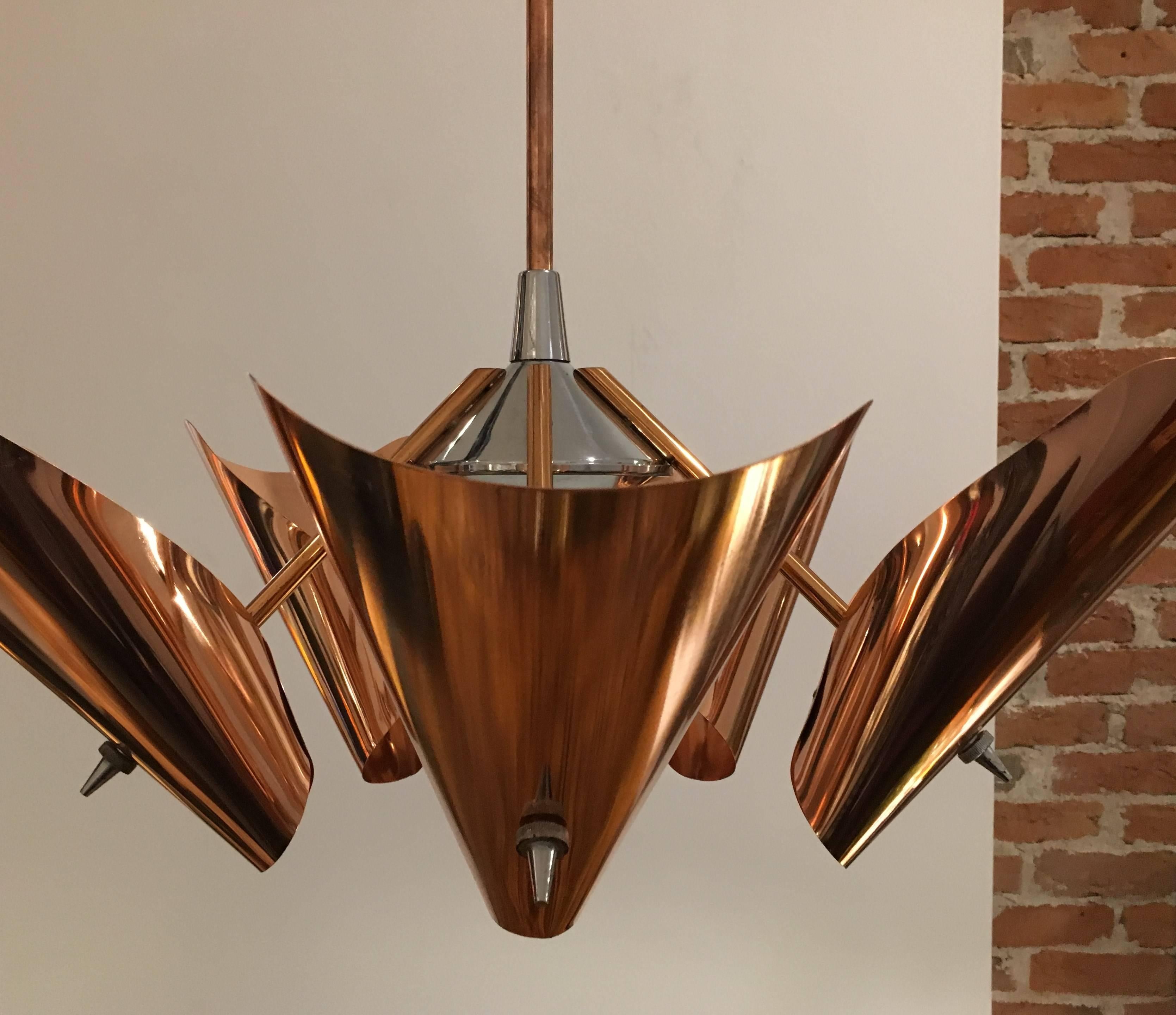 This five-armed chandelier made of copper and chrome-plated steel plate was produced in the Czech Republic in the 1960s by Drupol. 

We offer shop to door delivery worldwide. Please ask for a quote.