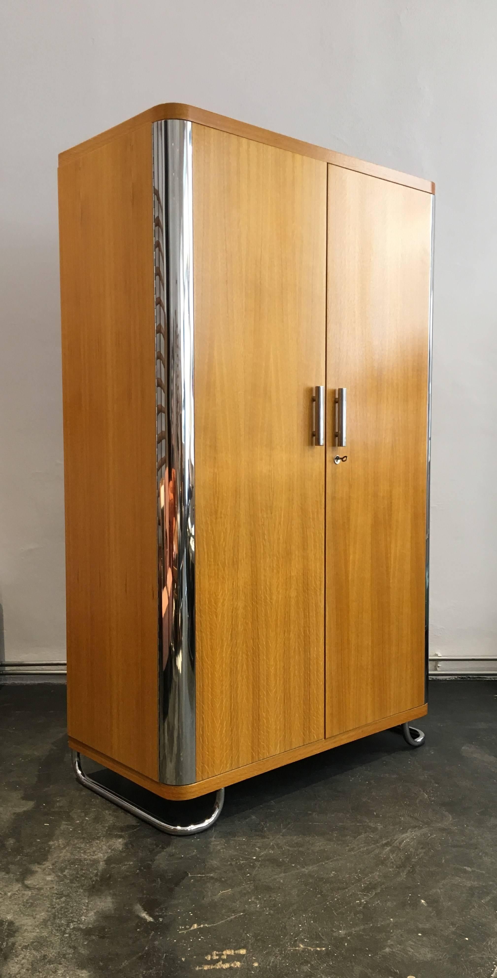 This oak wardrobe in style of Czech functionalism can be ordered as well
in other different colors or veneers. Delivery time 4-6 weeks.
The wardrobe is hand made in a very good quality. Other measures are possible.

We offer shop to door