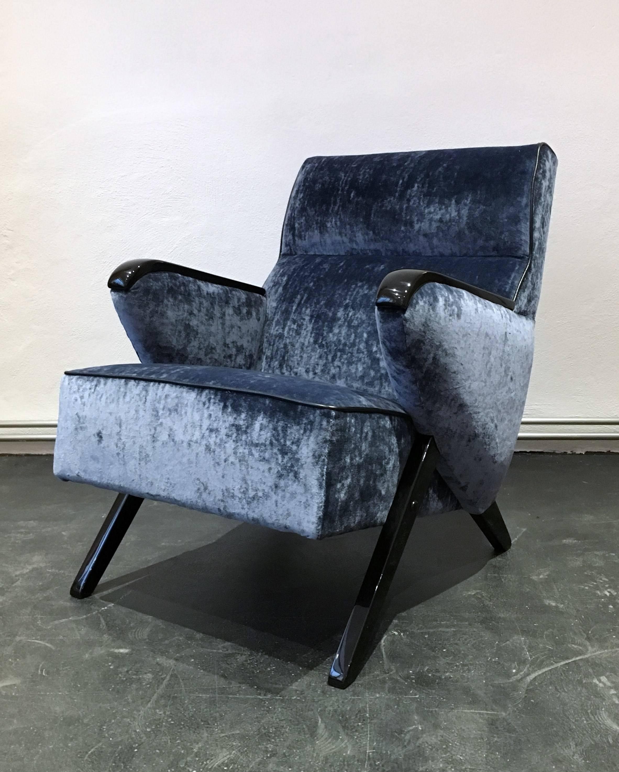 This chair and stool were made in the 1950s in the former Czechoslovakia.
The armchair has been completely restored with a new spring core and new black lacquer.
The stool has a padding of coconut fiber and sheep wool and was also repainted.
They