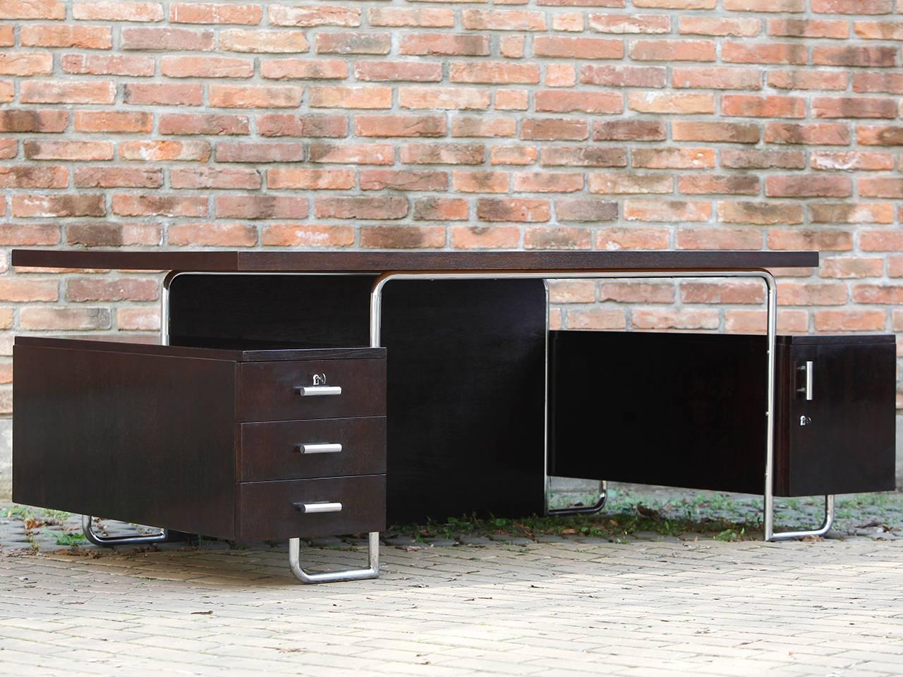 Unusually large desk made from chromium-plated steel tubing
Produced by Mücke Melder in the Czech Republic in the 1930s
These are tables were produced in relatively small number 
Completely restored, steel tube with original chrome plating.