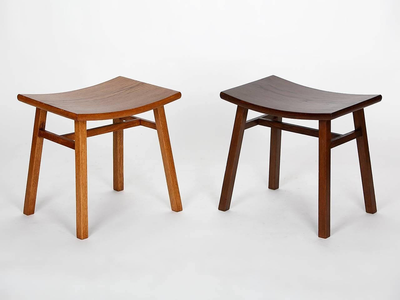 Produced in the 1960s in former Czechoslovakia, this pair of solid oak stools are light and dark stained.

 