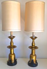Hollywood Regency Pair of Gilded Monumental Lamps with Cat's Paw Bases