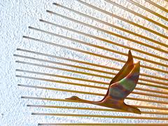 Mid-Century Modern Wall Sculpture "Birds in Flight on Sunburst"