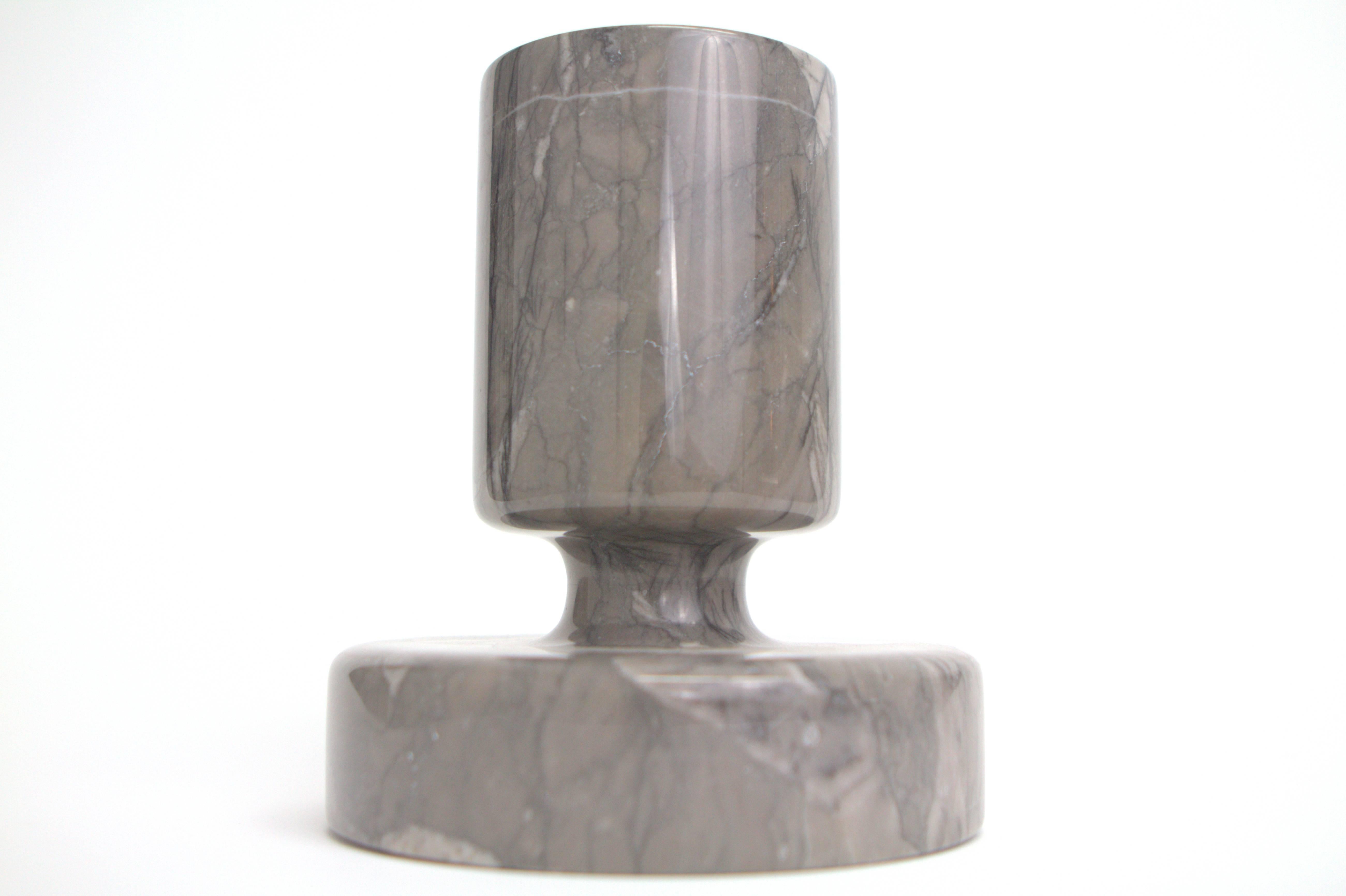 Beautifully crafted marble vessel designed by Angelo Mangiarotti distributed by Knoll. Can be a vase or pedestal bowl depending on orientation with small opening at 3.38