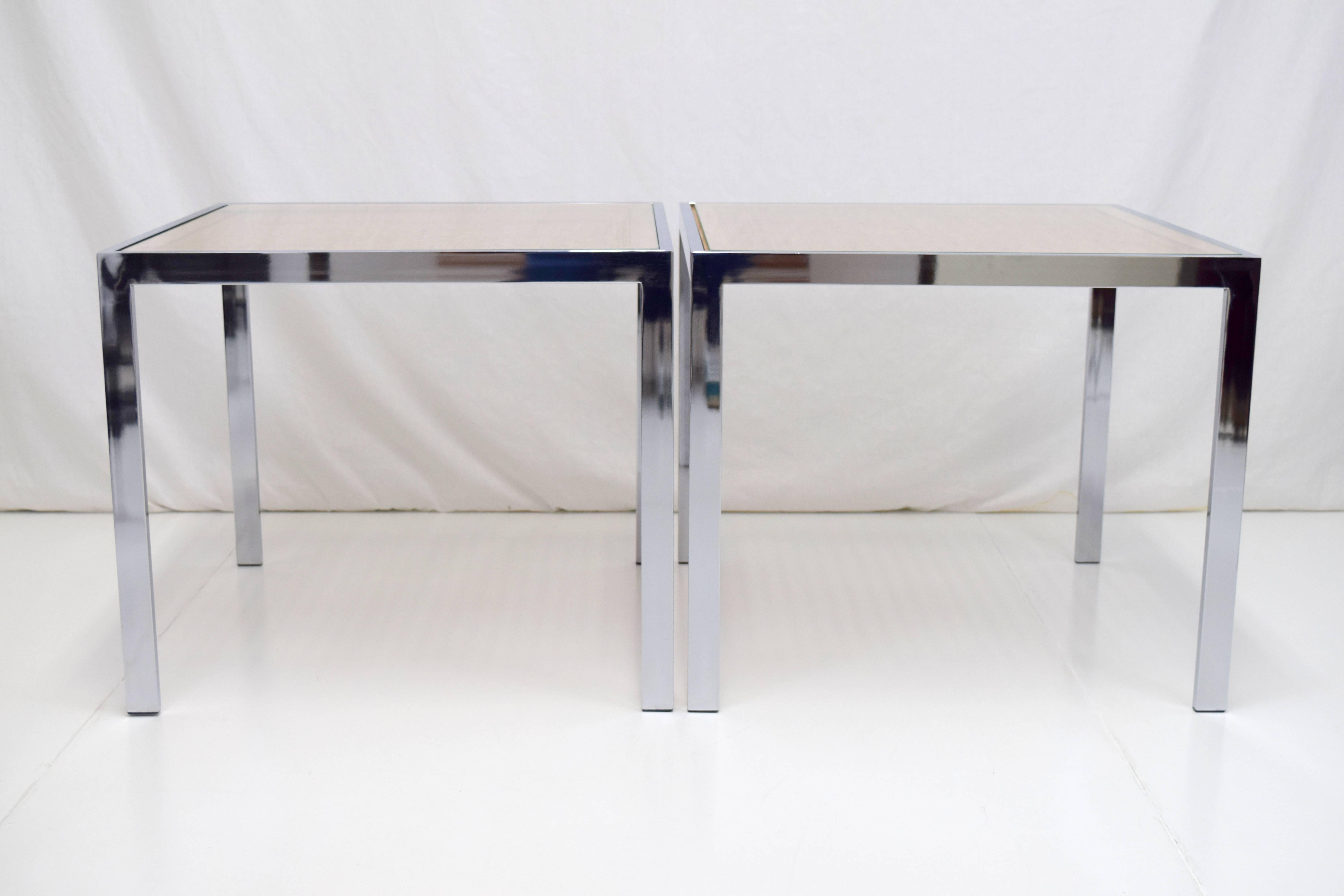 Milo Baughman cane and chrome end tables, pair. Glass over woven cane and wood tops with polished chrome frame finished in plastic caps. Square dimensions allows to be oriented with thin or thick profile Silhouette.