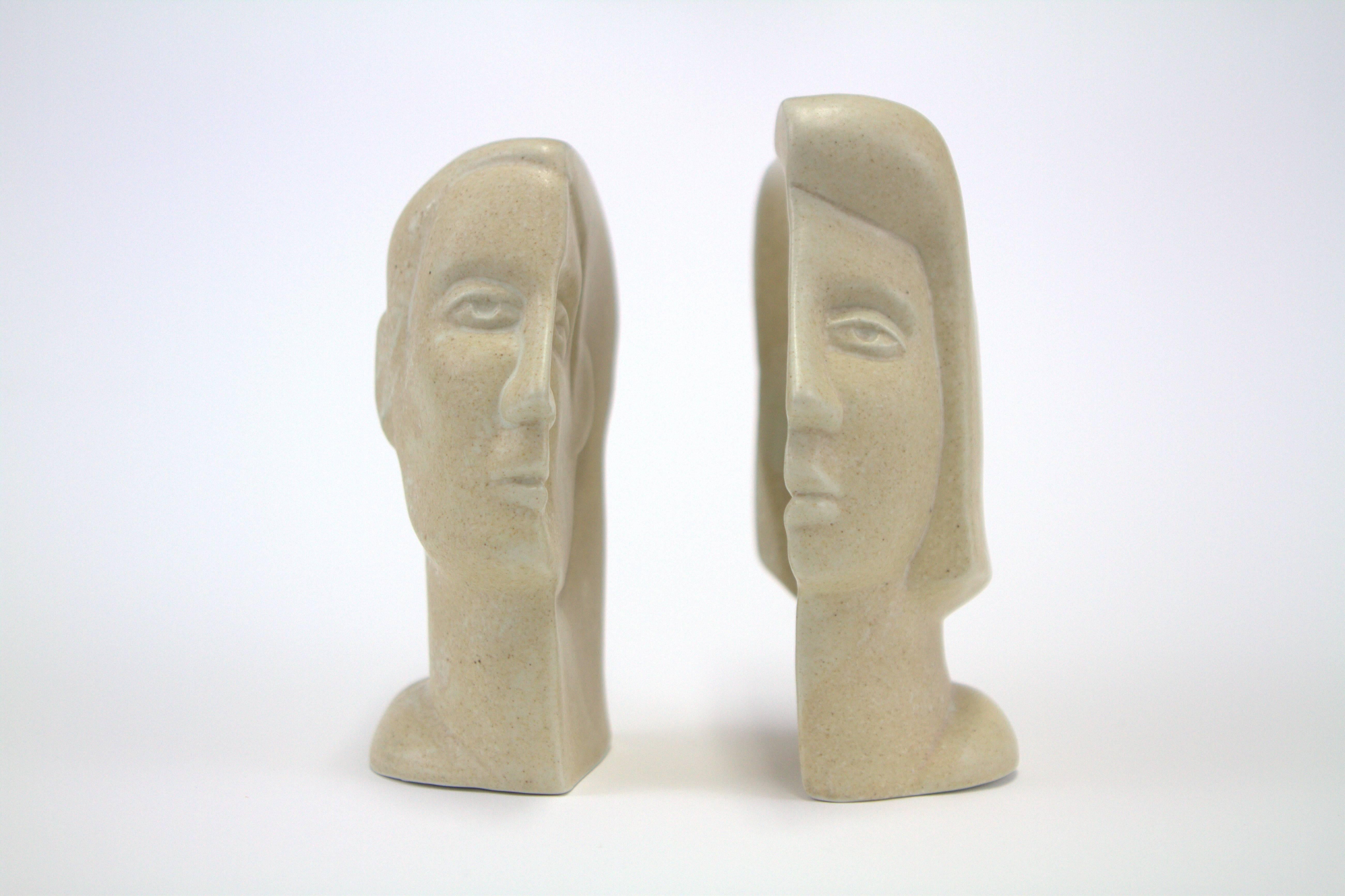 Fascinating interlocking male and female busts by Peter Wright (1919-2003). Slip cast porcelain with mottled glaze, signed 