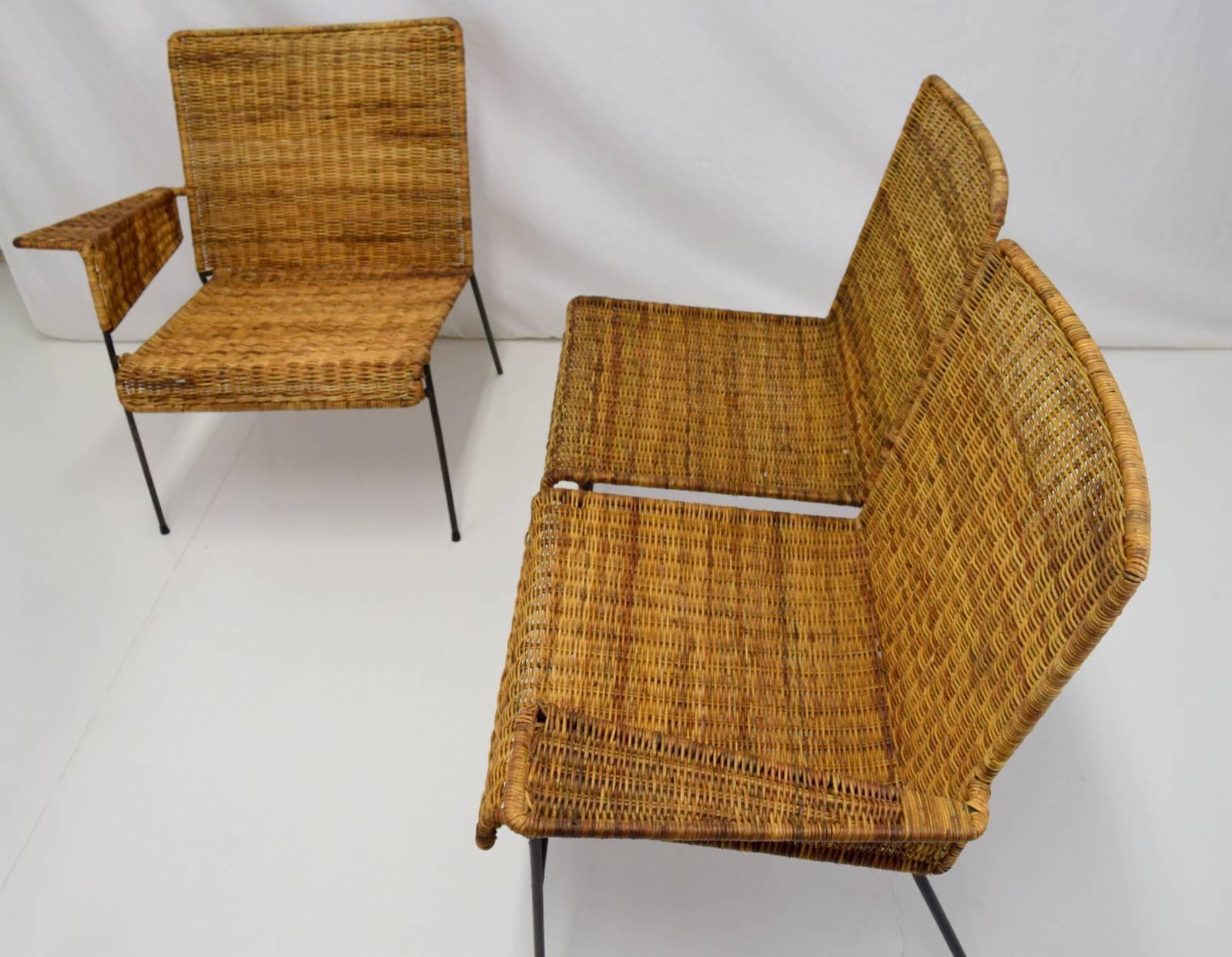 Early modular set by Van Keppel-Green in iron and wicker. Set comprised of two single arm chairs and one armless chair. Multiple configurations possible to create a sofa, or loveset. Shows sign of age with some breaks in wicker and wear to iron