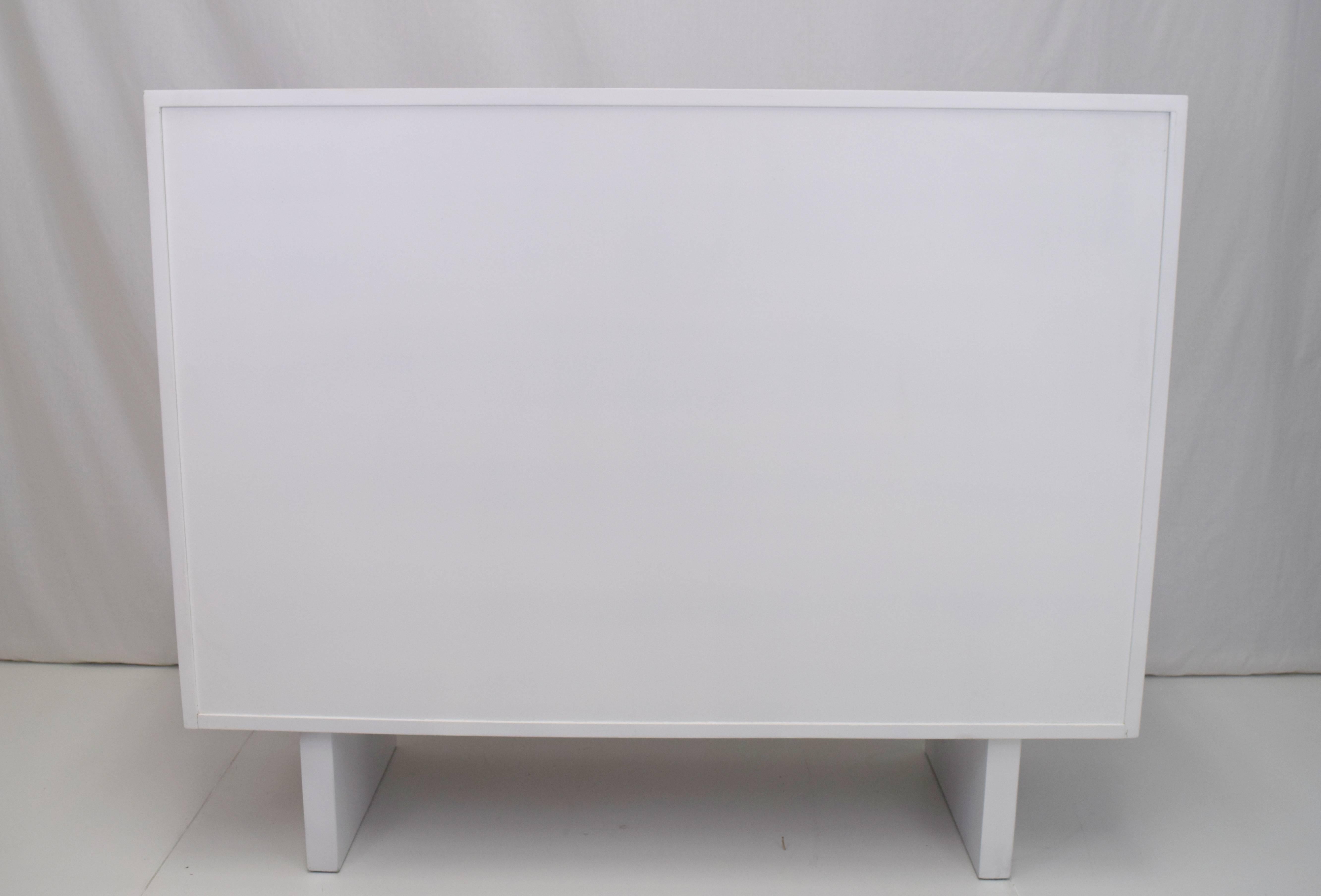 Mid-20th Century White Lacquered Wardrobe Cabinet by James Wylie for Widdicomb   For Sale