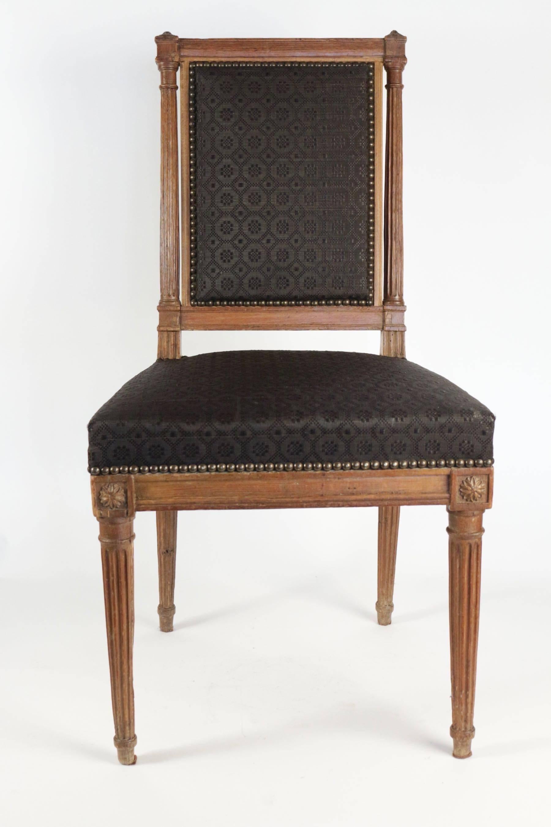 Set of eight small dining chairs in beechwood, Louis XVI style dating for the French mid-19th century, circa 1850.