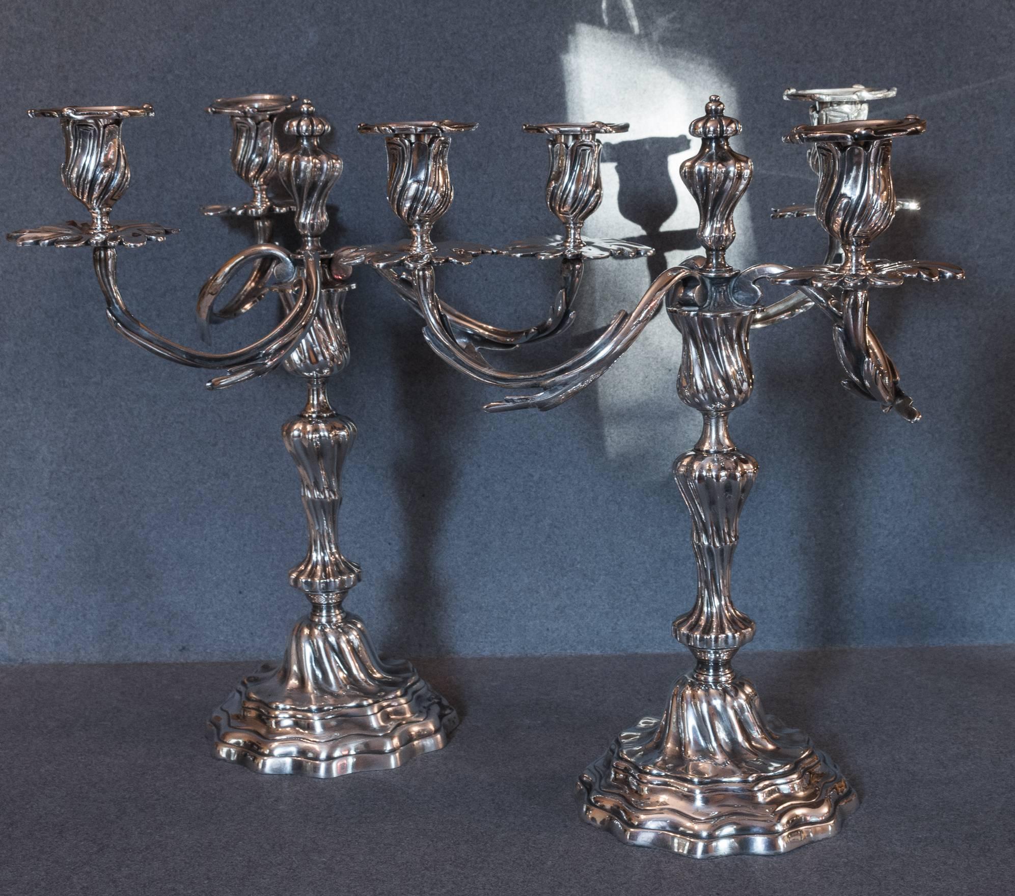 Gorgeous all original pair of fine Louis XV style mid-19th century silver plate three-arm candelabras, the scrolling arms are detachable, converting the pieces to single candlesticks.

Very beautiful French, mid-19th century work, circa