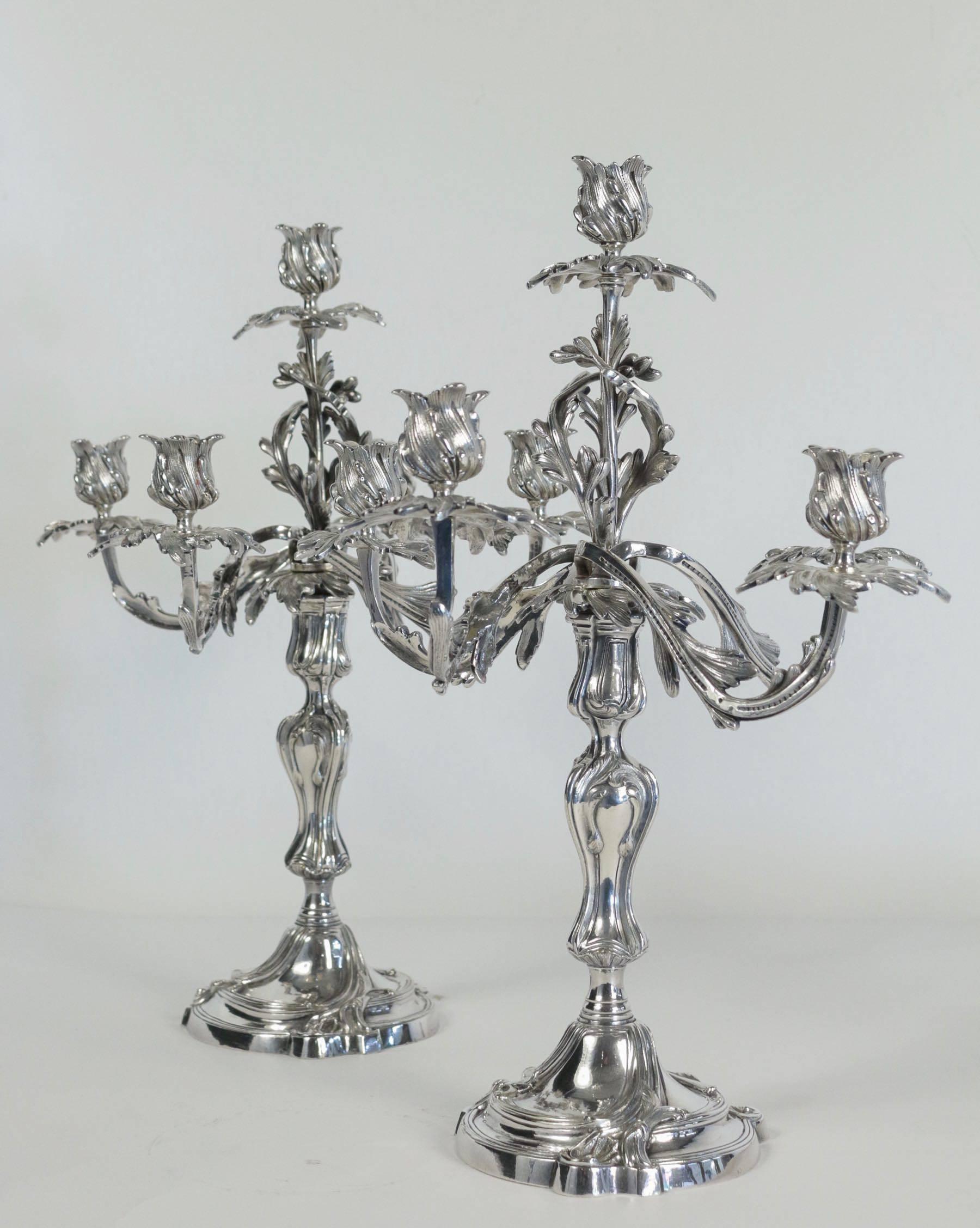 We are pleased to present you a gorgeous all original pair of elegant Louis XV style mid 19th-century silverplate Five arm candelabras, the scrolling arms are detachable, converting the pieces to the single candlestick.

Lovely French mid