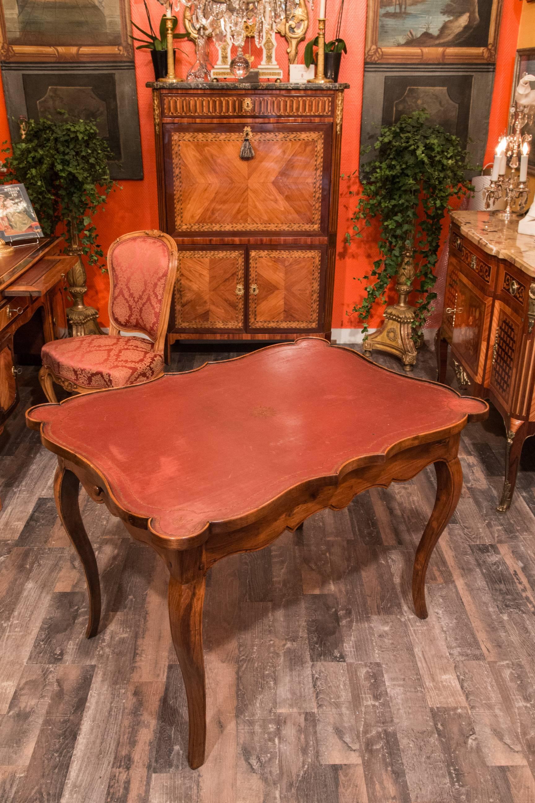 We are pleased to present you, a lovely and exciting chestnut game table circa 1740, having a drawer on each side and an embossed leather playing surface. Our game table rests on serpentine legs.

French Louis XV period, mid-18th century, circa